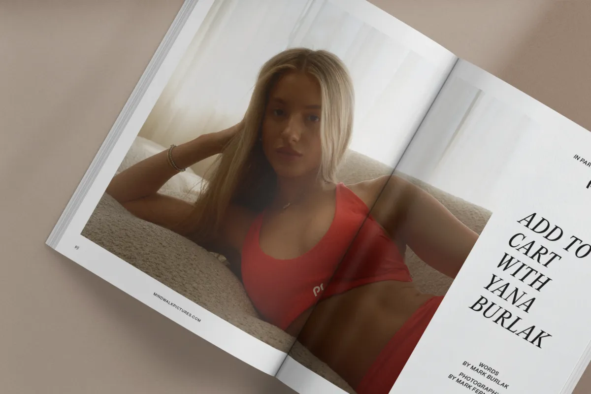 Open magazine spread featuring Yana Burlak in the red Winter Rose set, with the line “Add to cart with Yana Burlak”