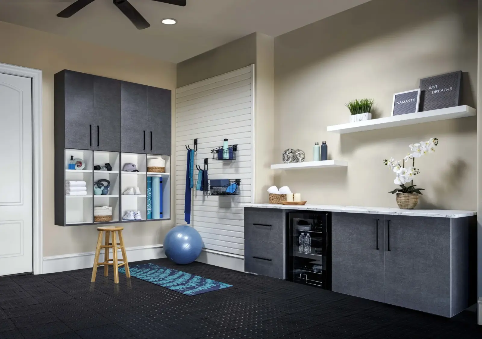 Garage studio with pewter cabinetry and marble countertops