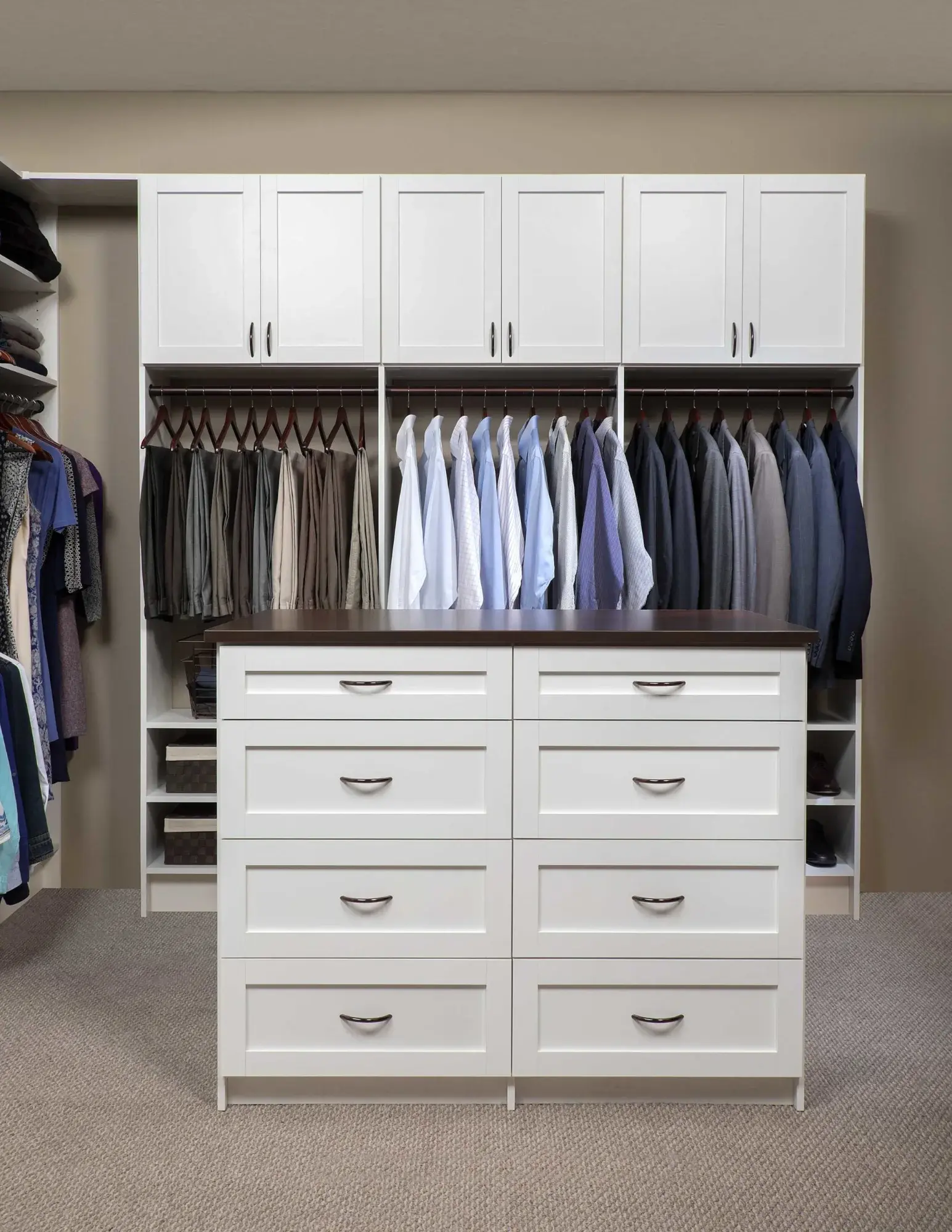 White walk-in closet with drawers and shirt shelving