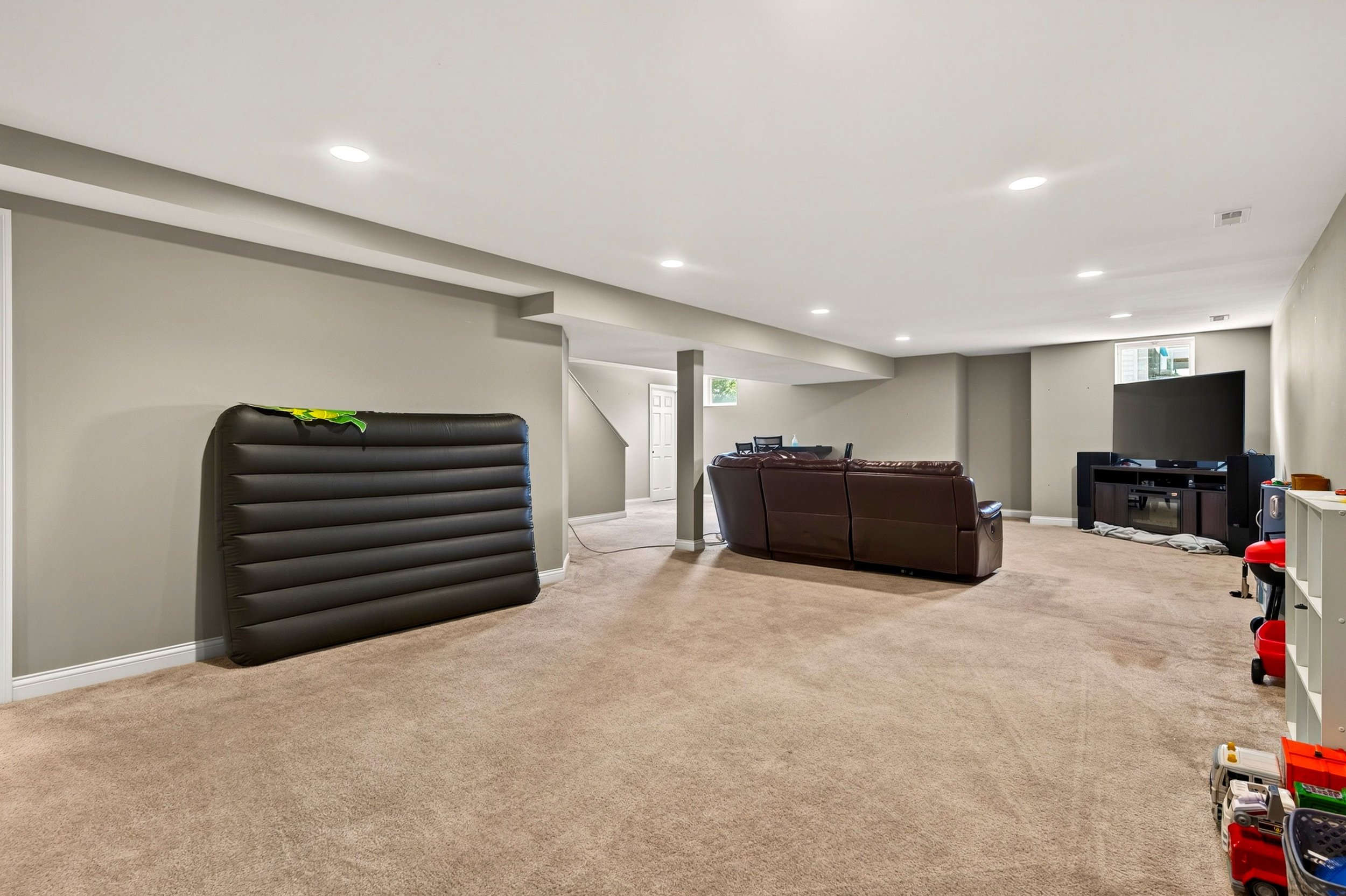 Finished lower level with open recreation space