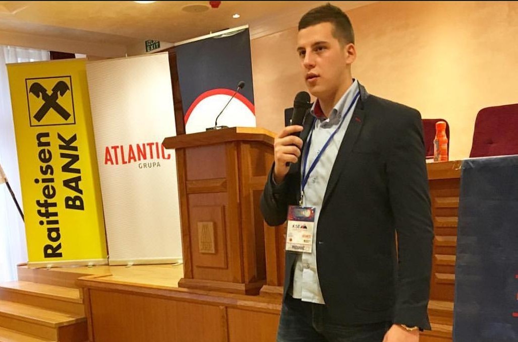 Filip speaking at a business conference