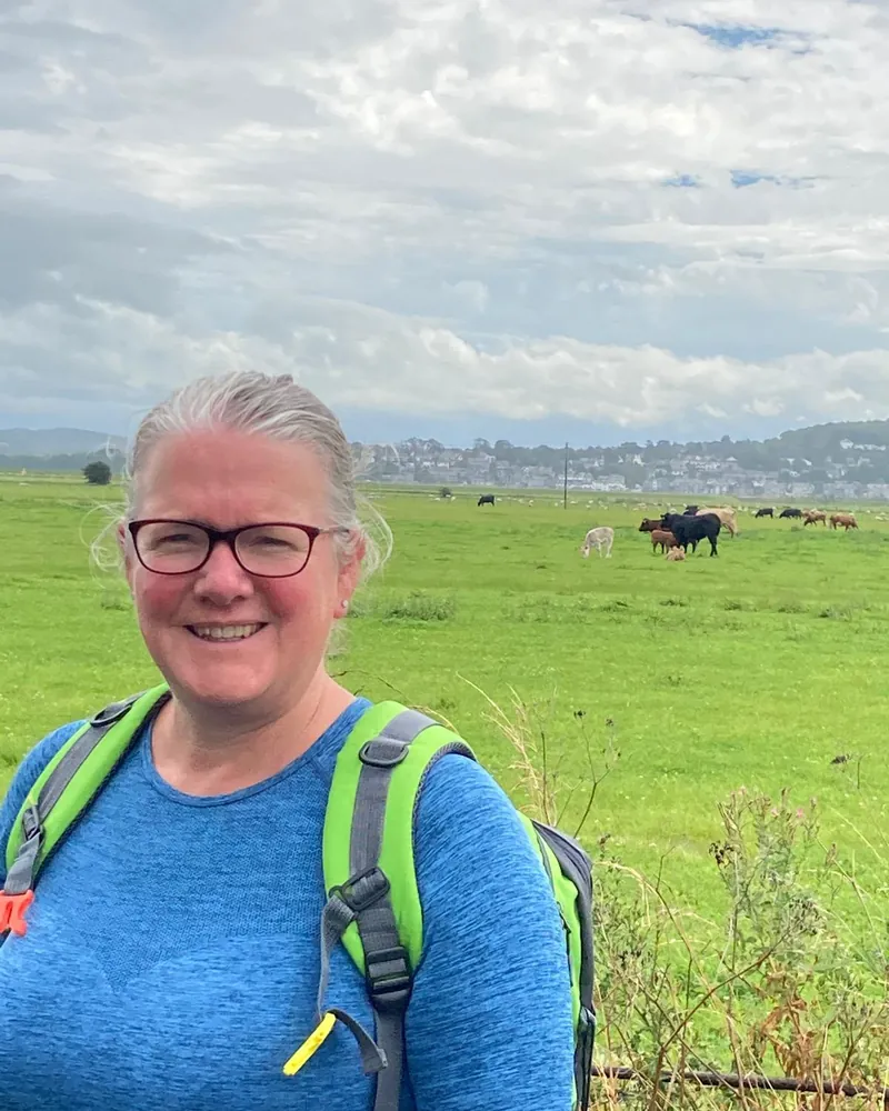Josie out walking with a rucksack, 16kg lighter after her 90-day programme