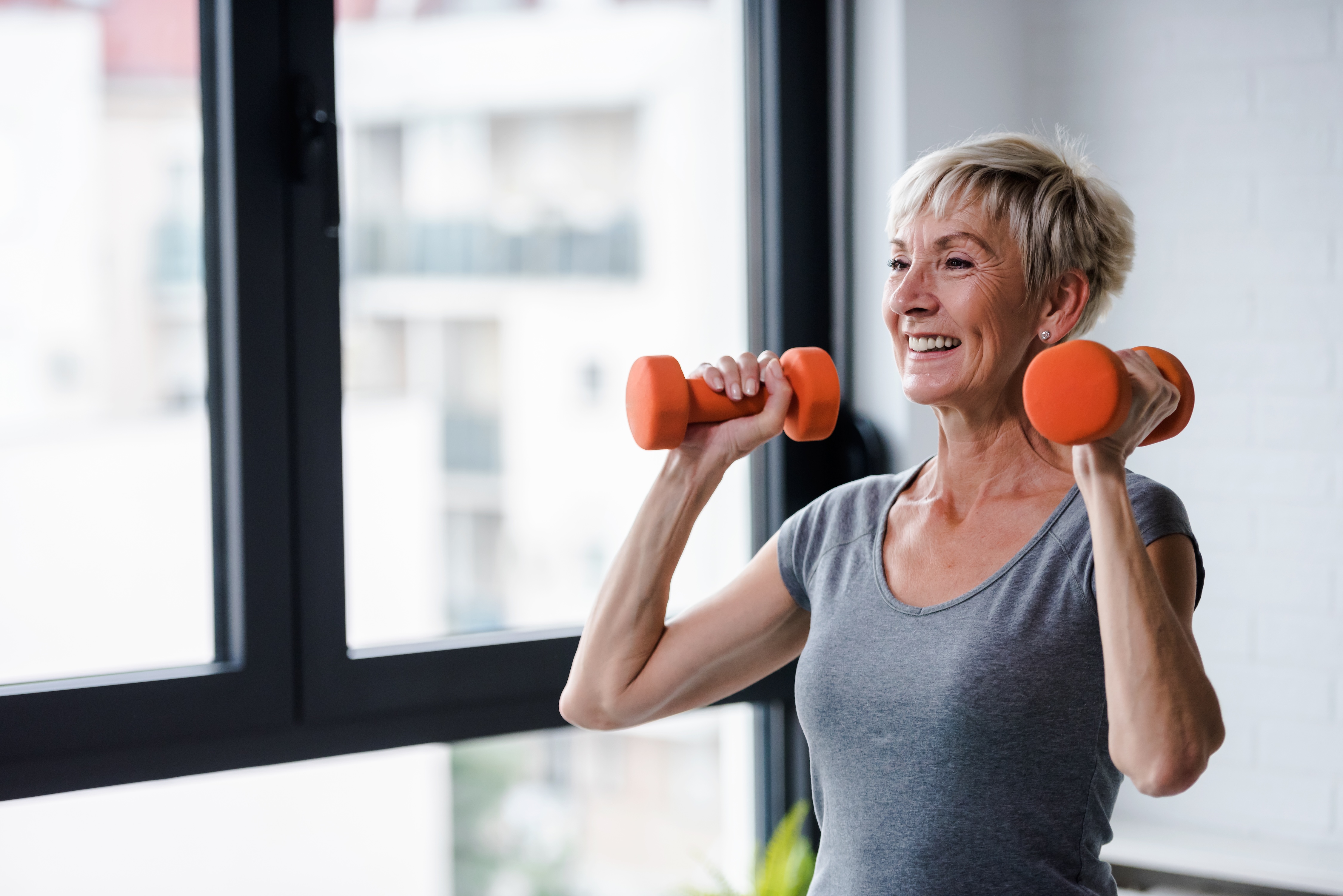 Senior woman working out stock image