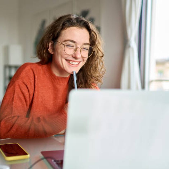 Student studying online at her laptop