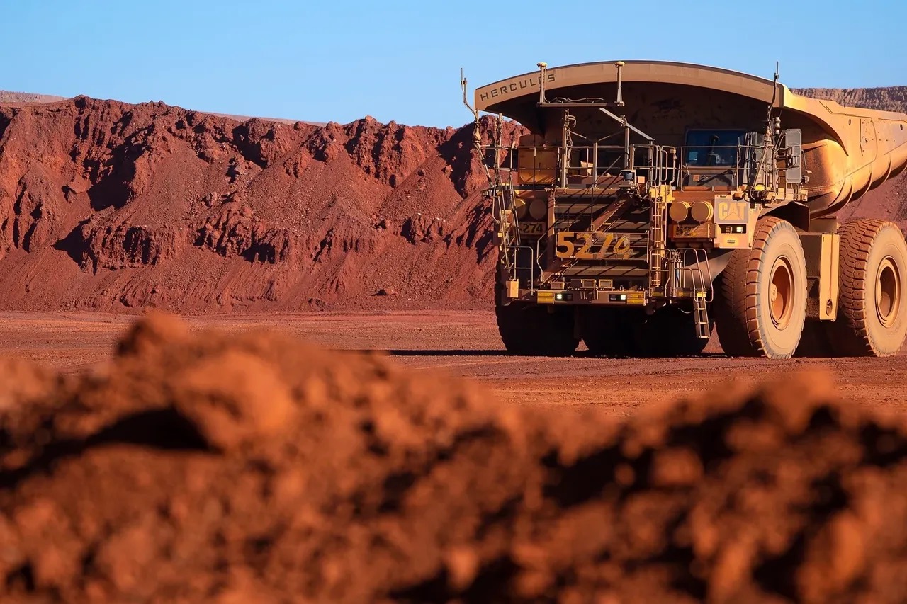 Haul truck on a remote mine site at dusk