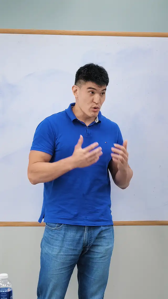 Participant practising confident delivery at a Singapore public speaking course