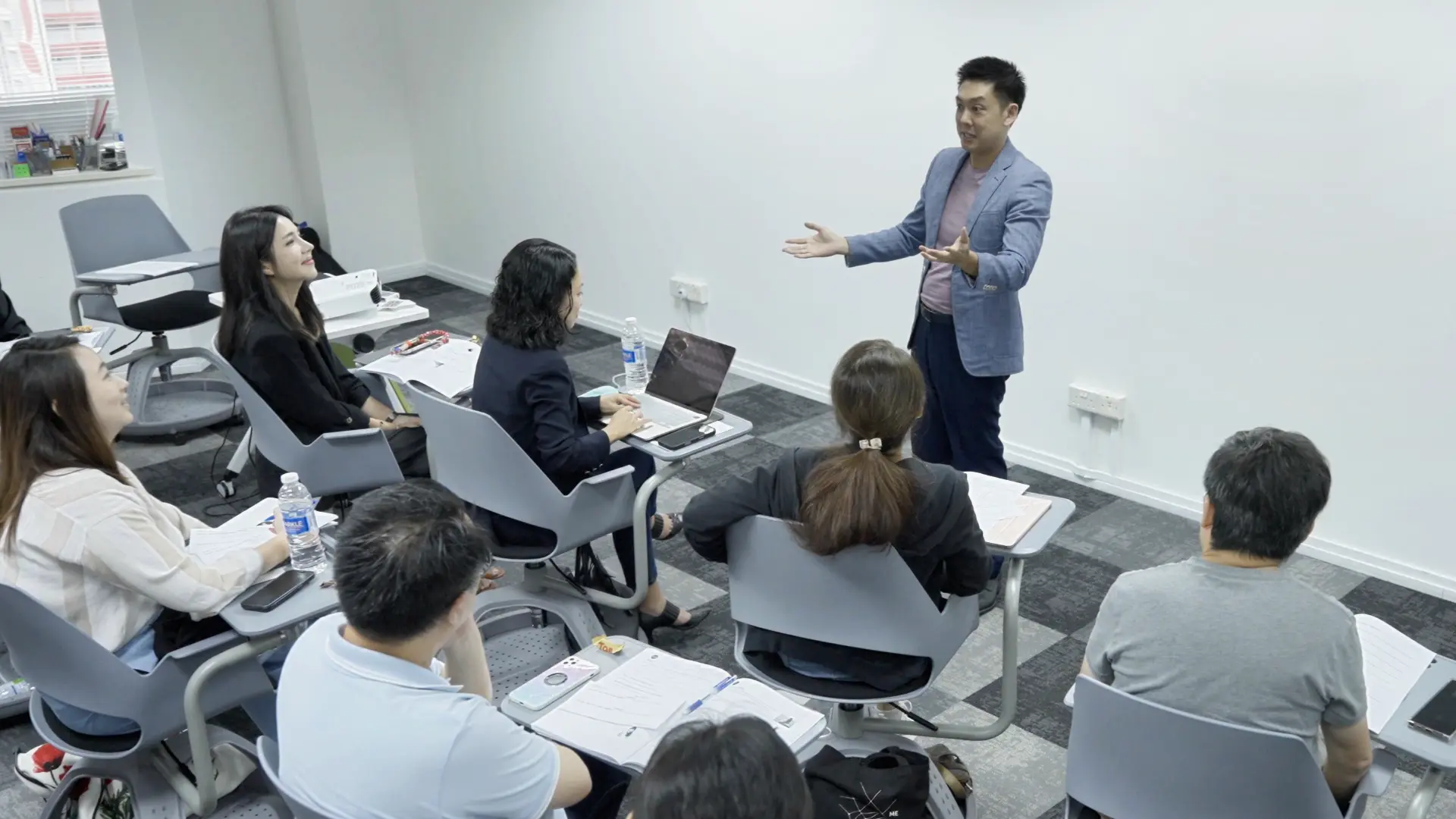 Course participants practising with feedback in a Speak Sell Succeed class
