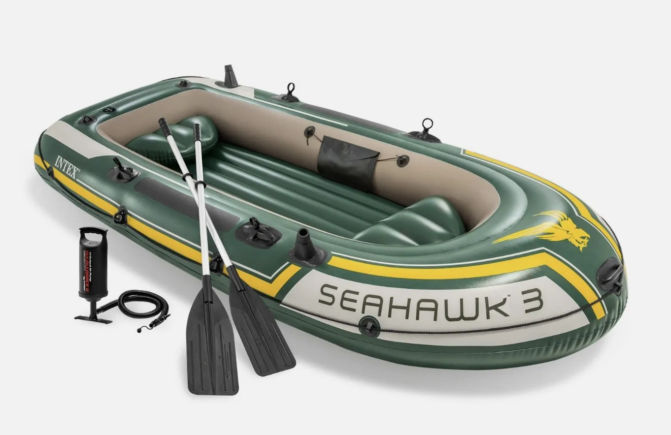 Inflatable boat with inflator and oars