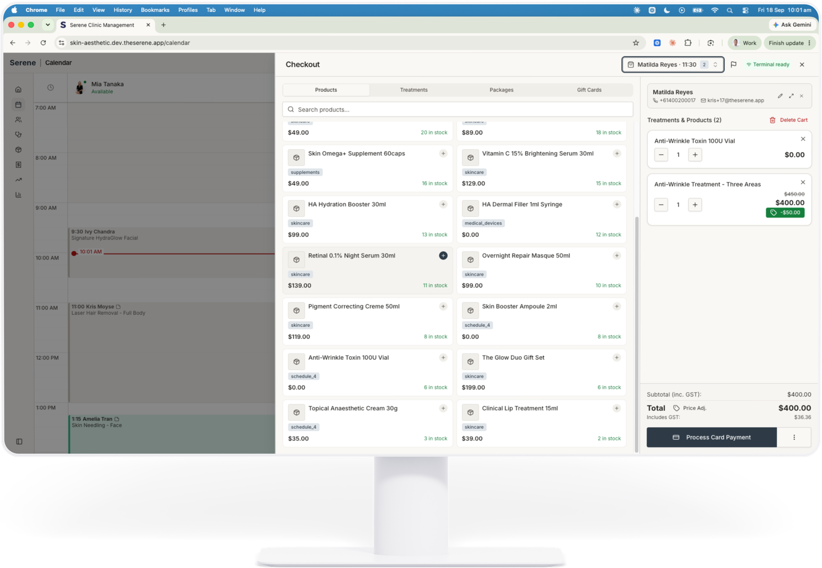 Serene checkout screen with treatments, products and a card payment in progress