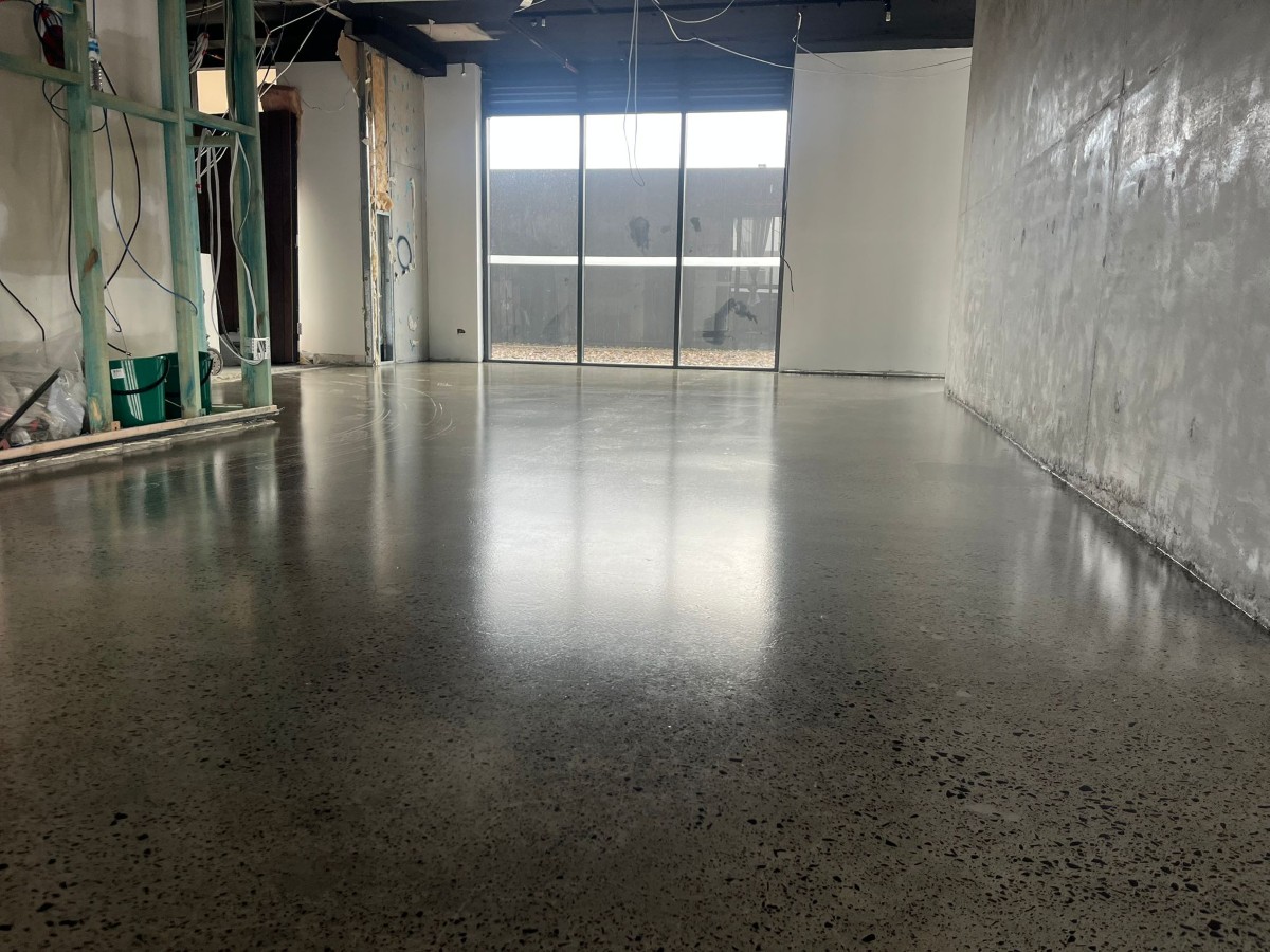 Polished concrete flooring across a commercial interior