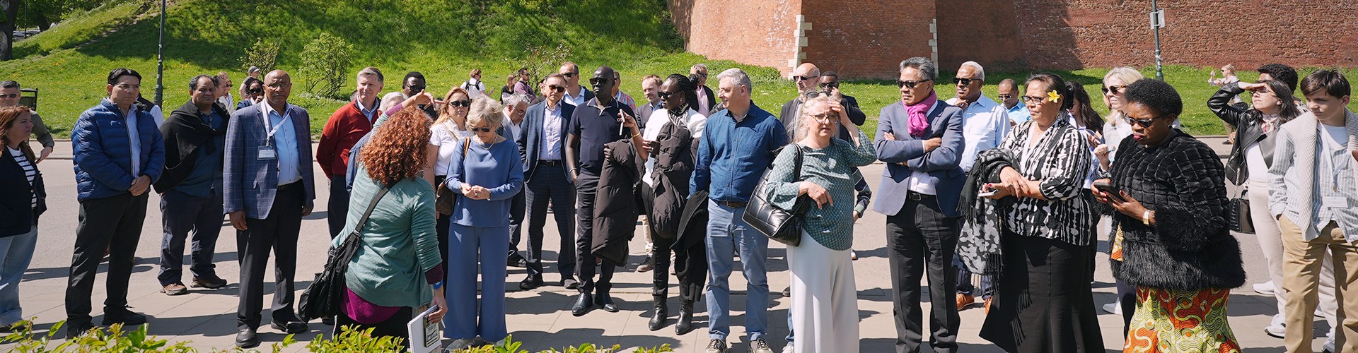 Members of a Together With Israel delegation gather outdoors during a visit.