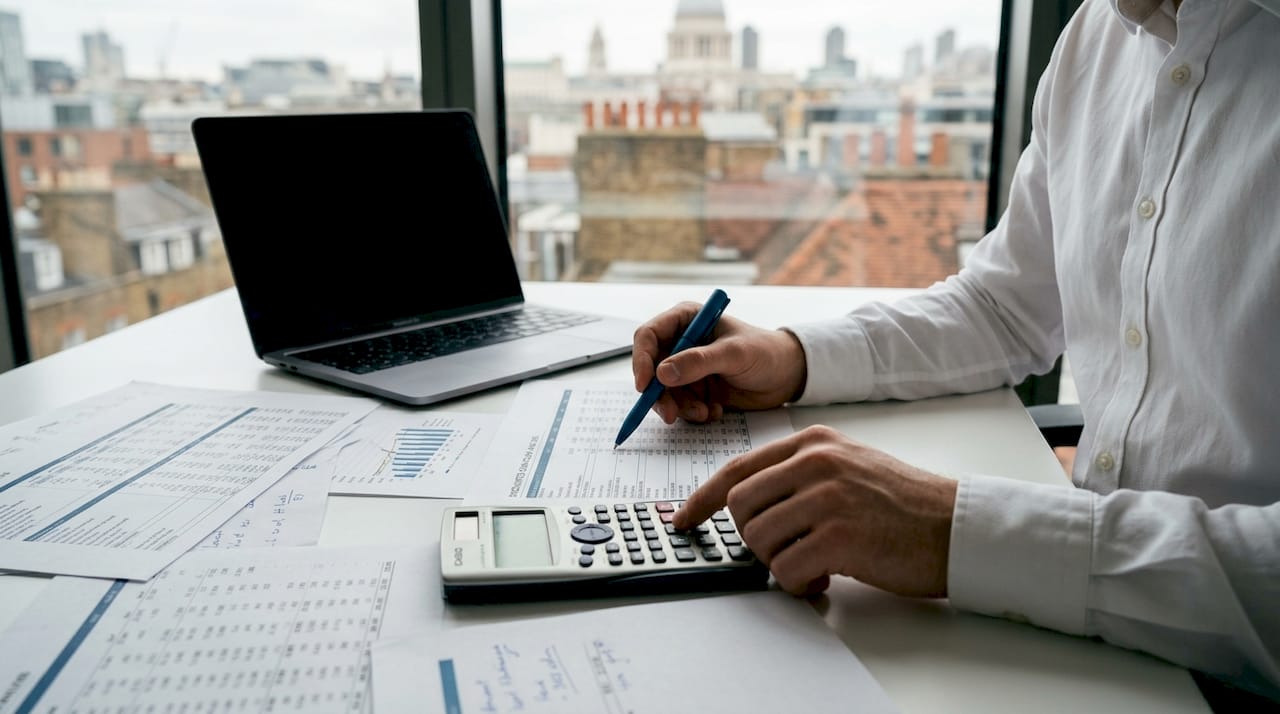 Accountant calculating income approach valuation