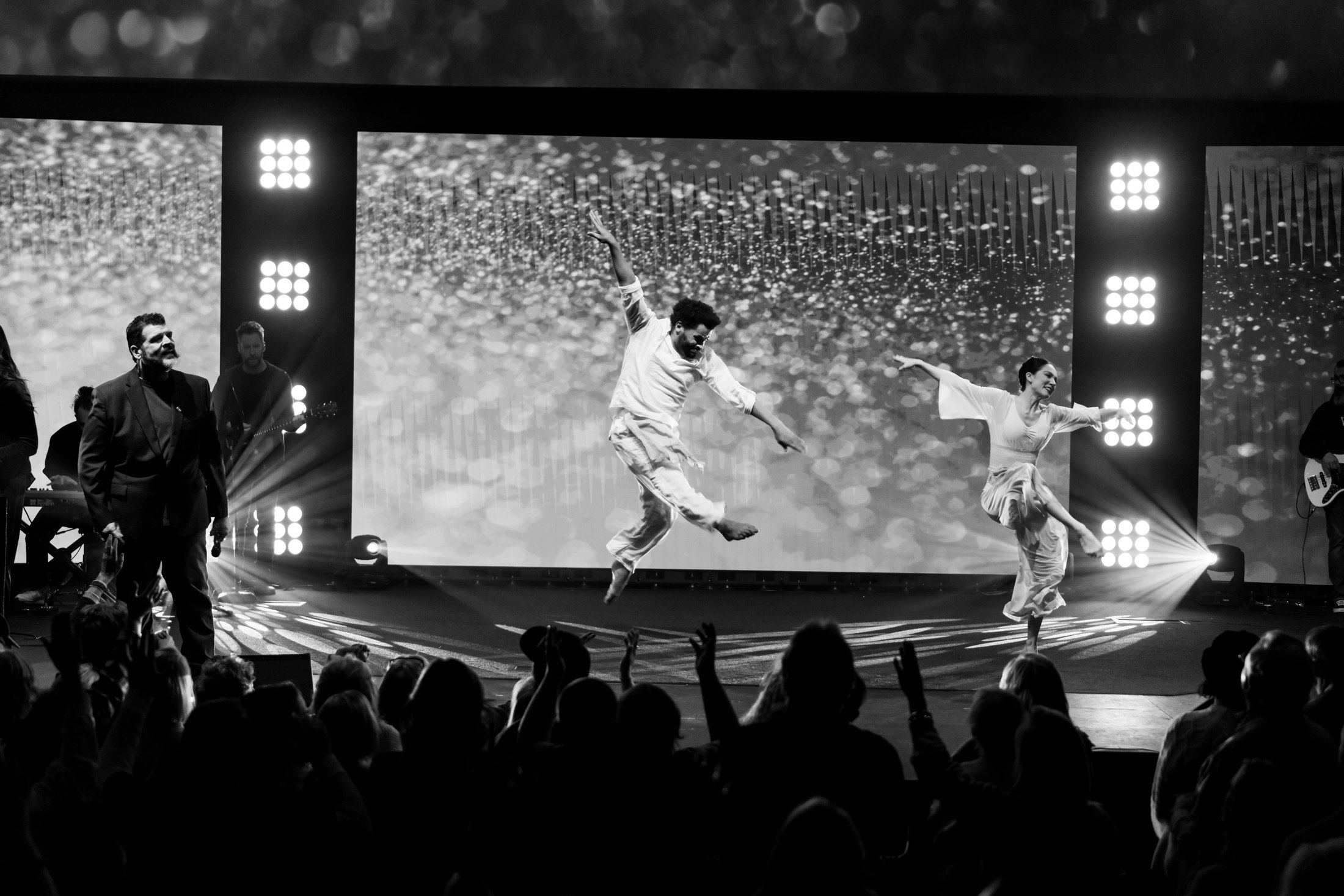 Dancers and musicians performing on stage