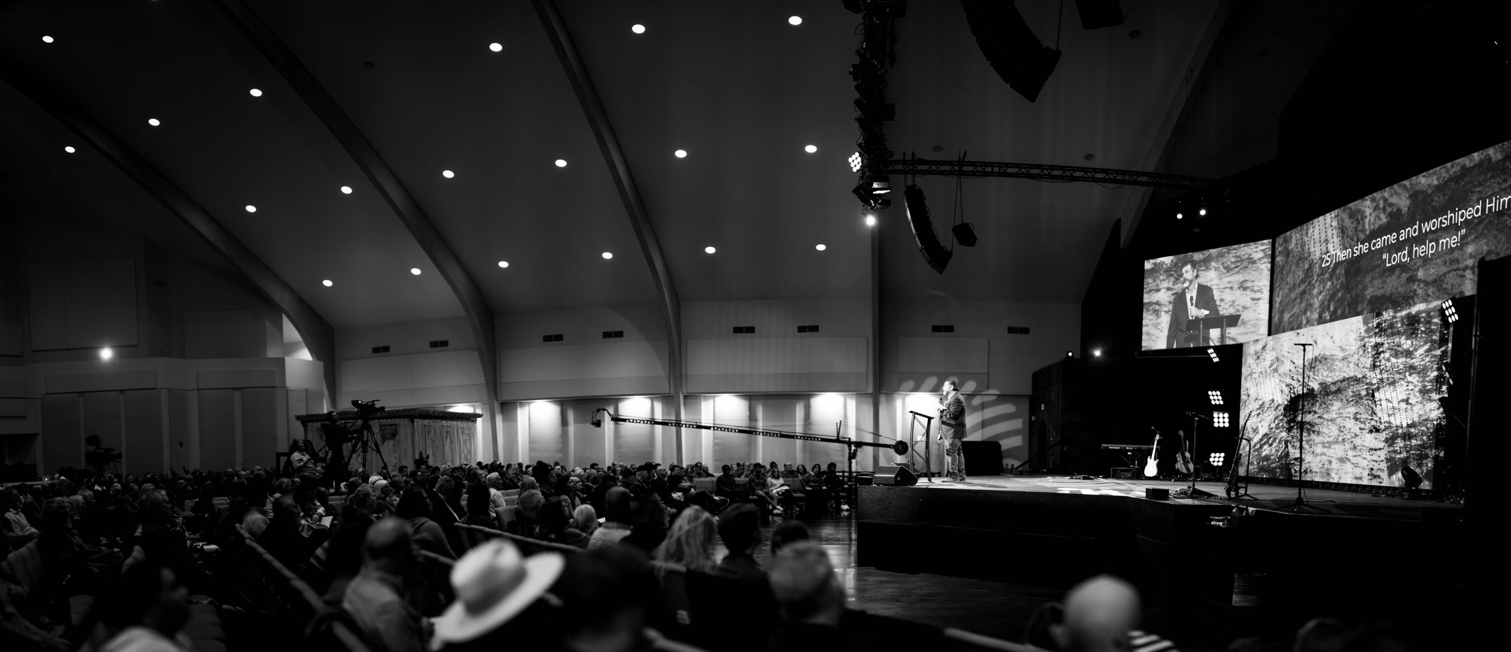 A panoramic view of a service from the side of the room