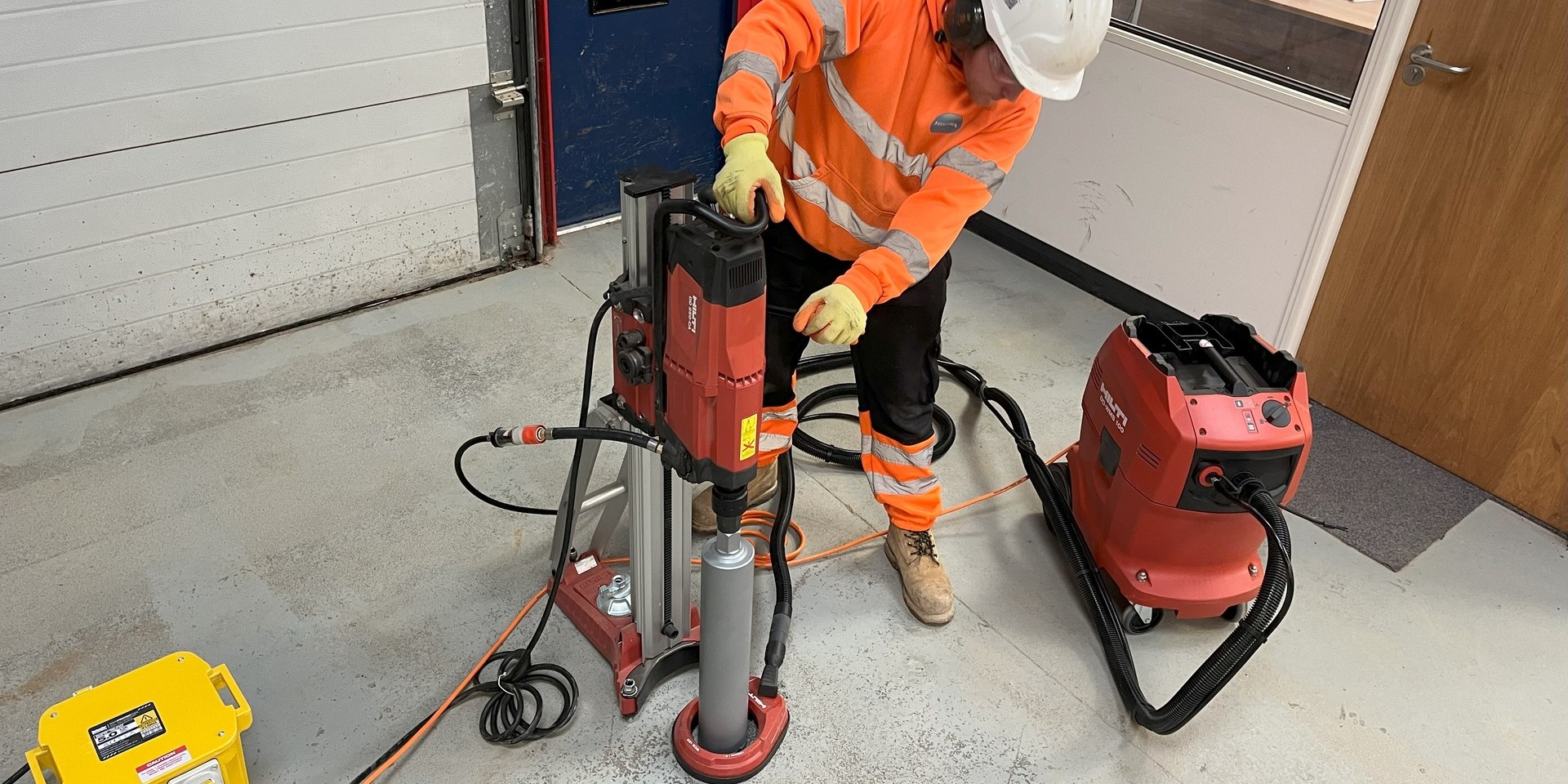 Diamond-core drilling rig in operation on a Hixtra project site