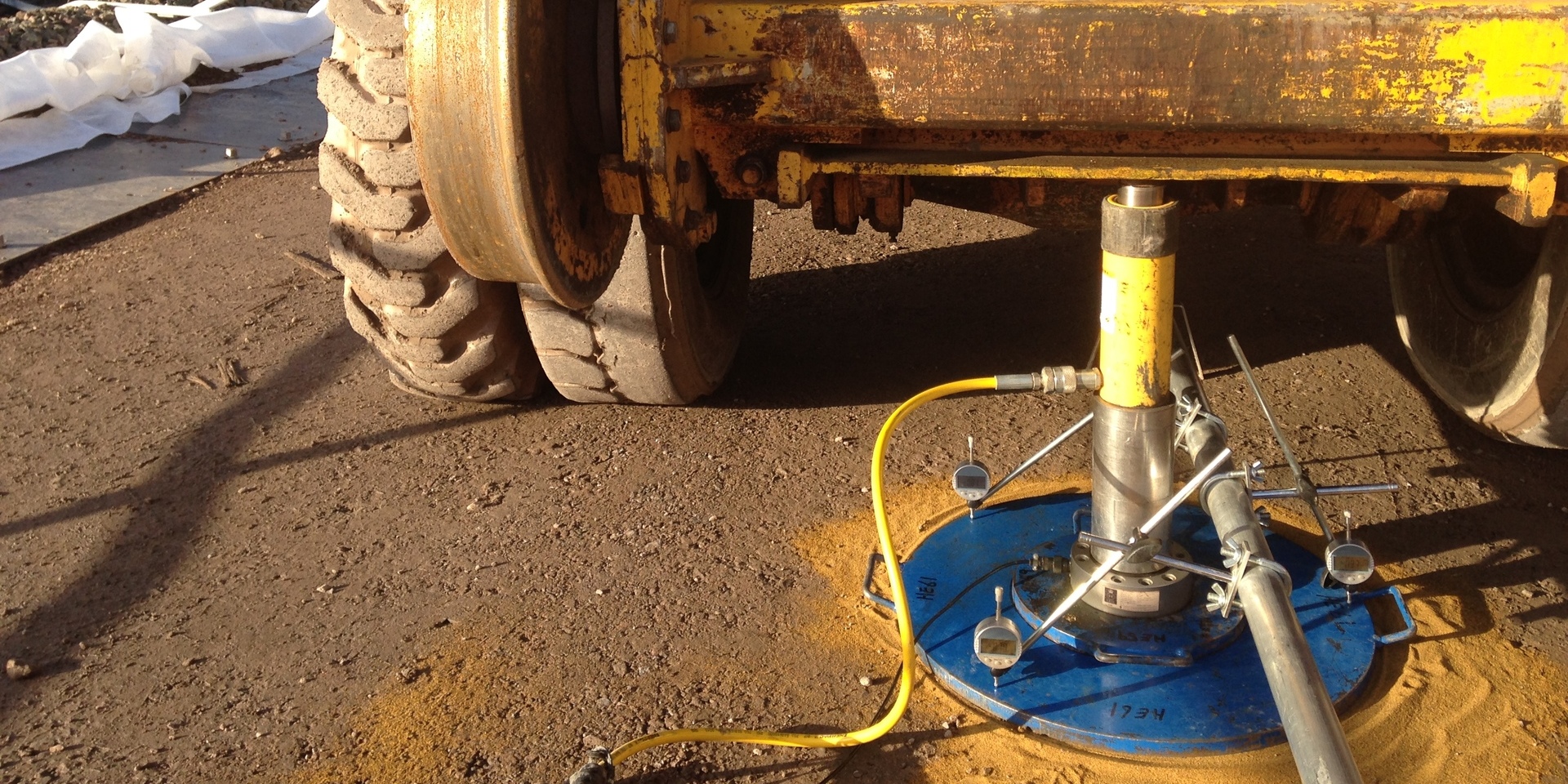 Hixtra technician testing lime-stabilised material on a construction site