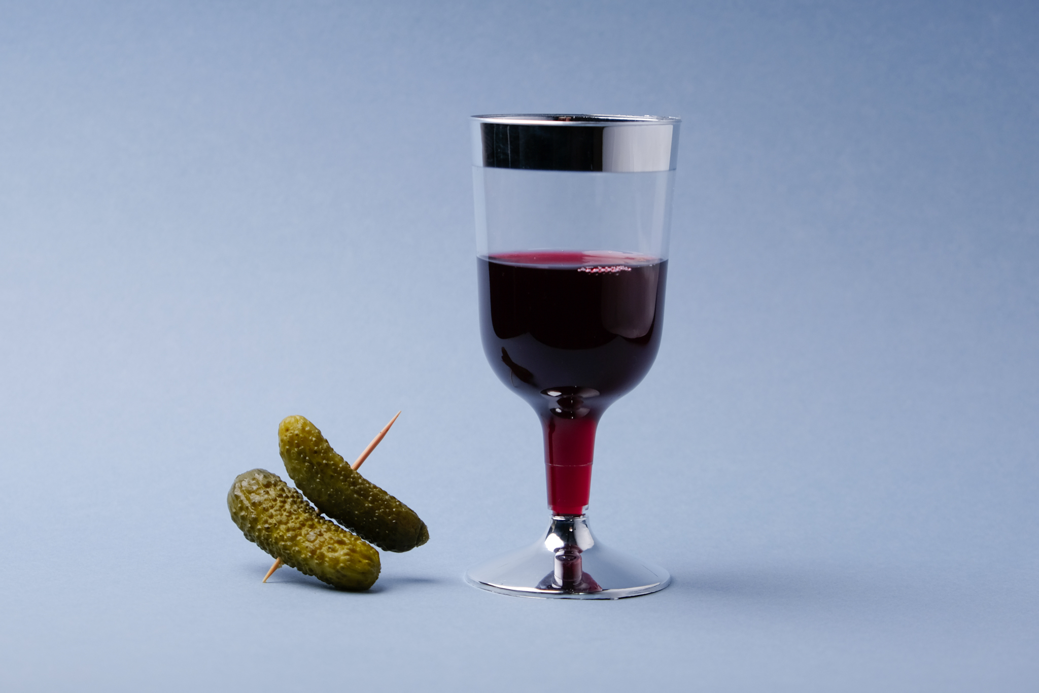 Silver Line Wine Glass with Cornichons on side