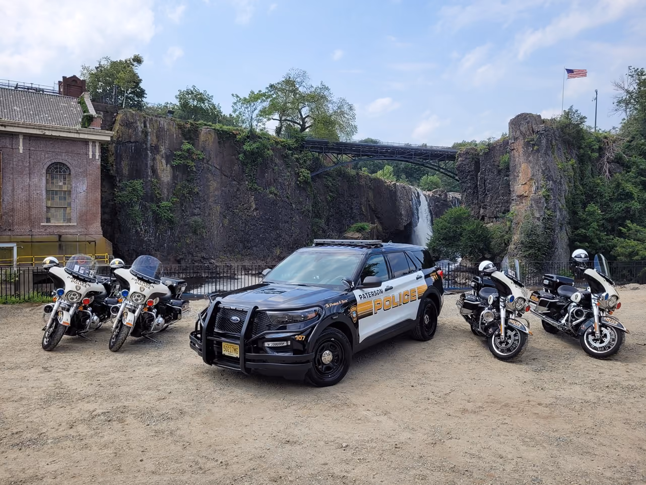 Paterson Police officers Motorcycle and police car

