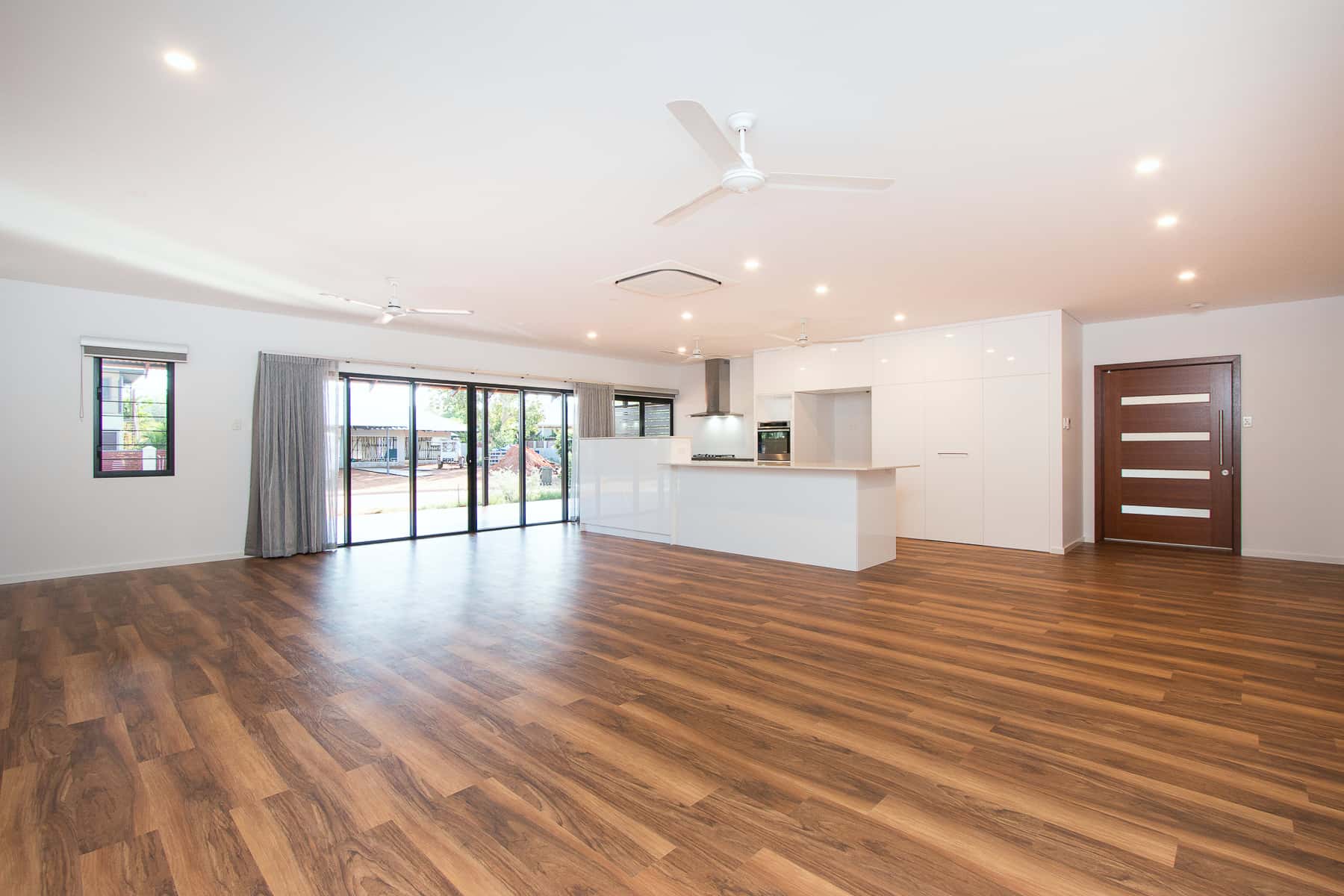 Open-plan living and kitchen in an earlier home built by Michael Smyth