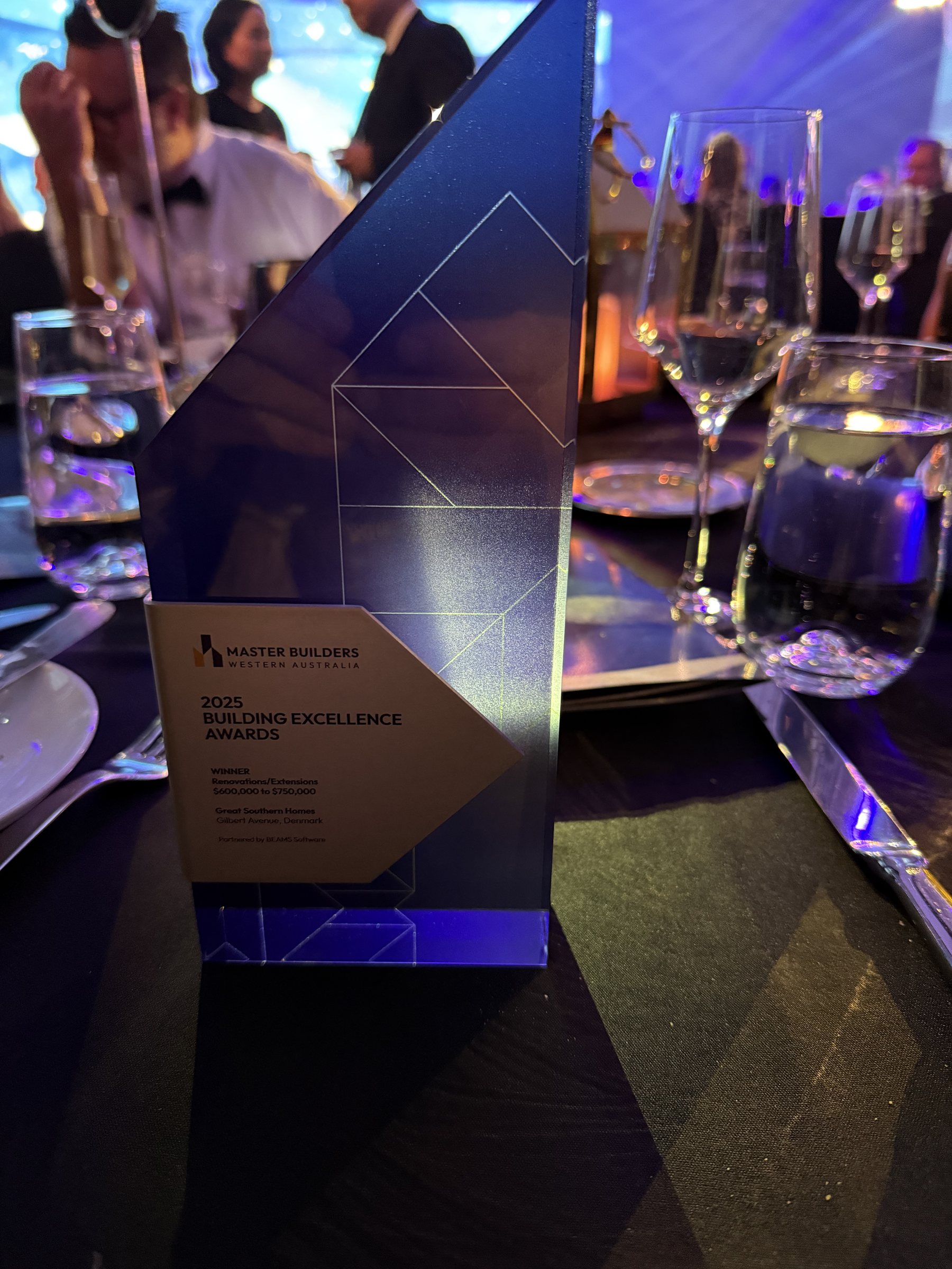 Great Southern Homes' 2025 Master Builders WA Building Excellence Award trophy on the gala table