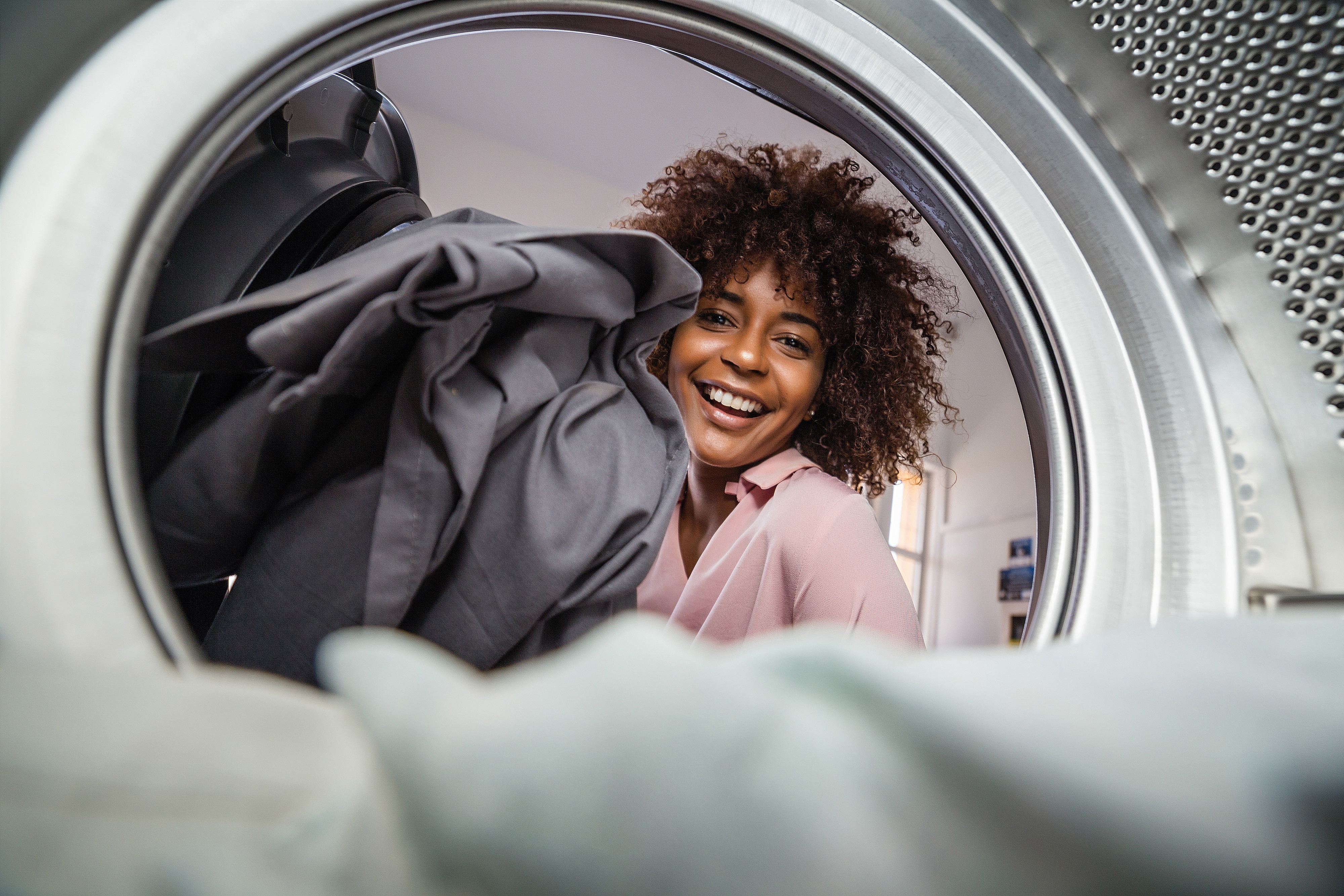 Person doing laundry stock image