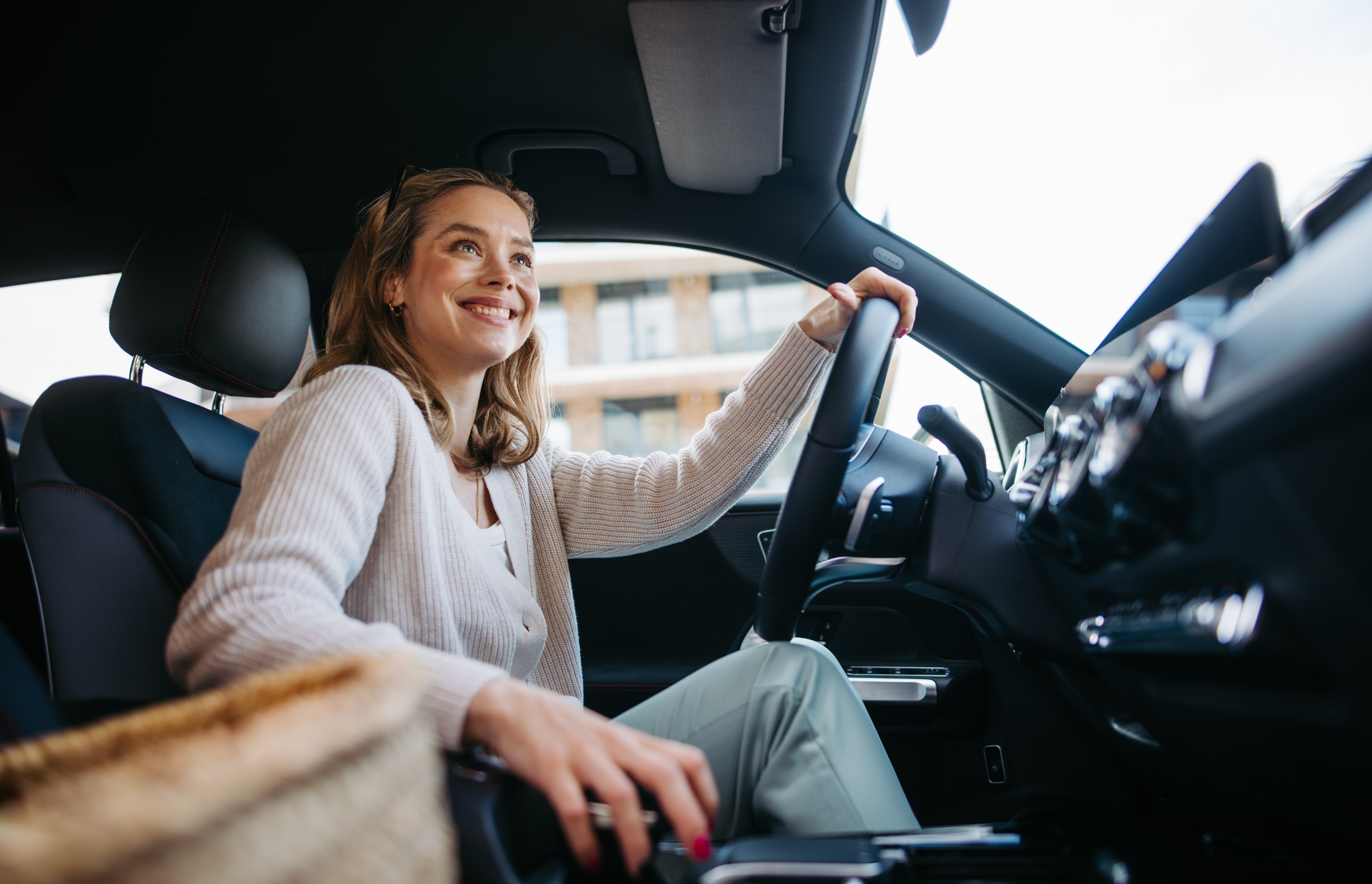 Girl in car driving stock image