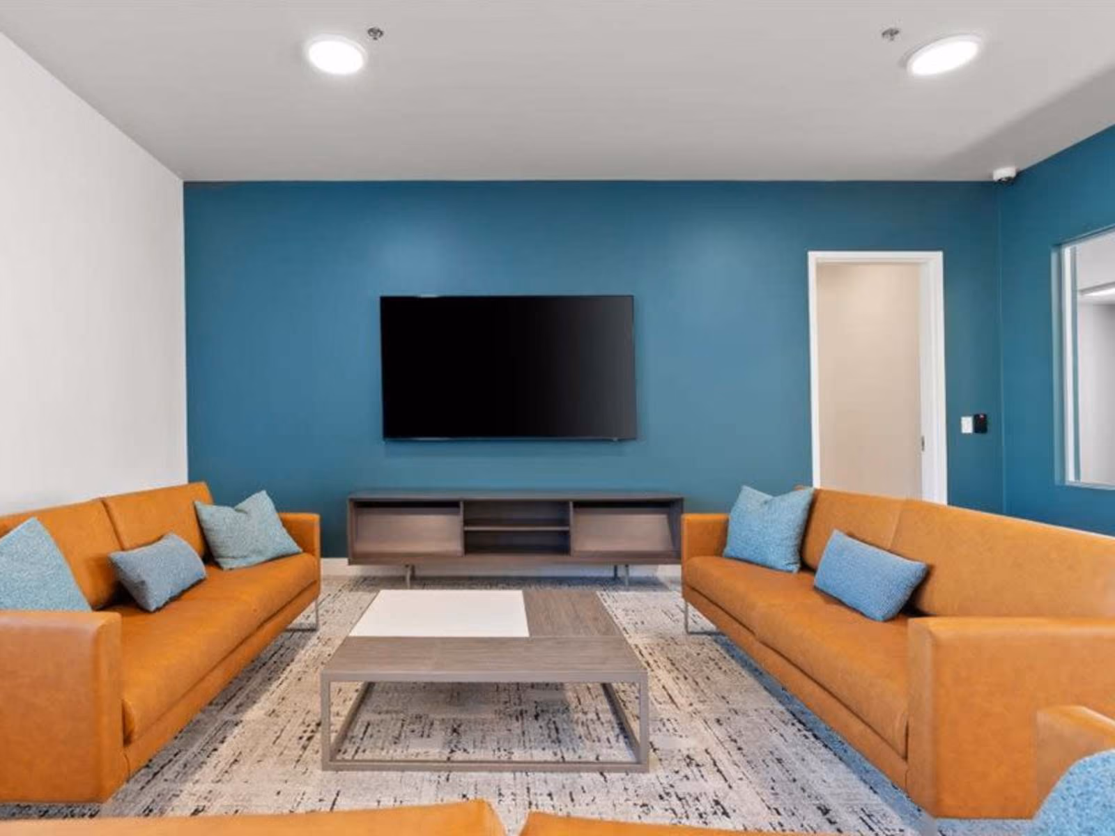 Residents lounge with sofas and tv