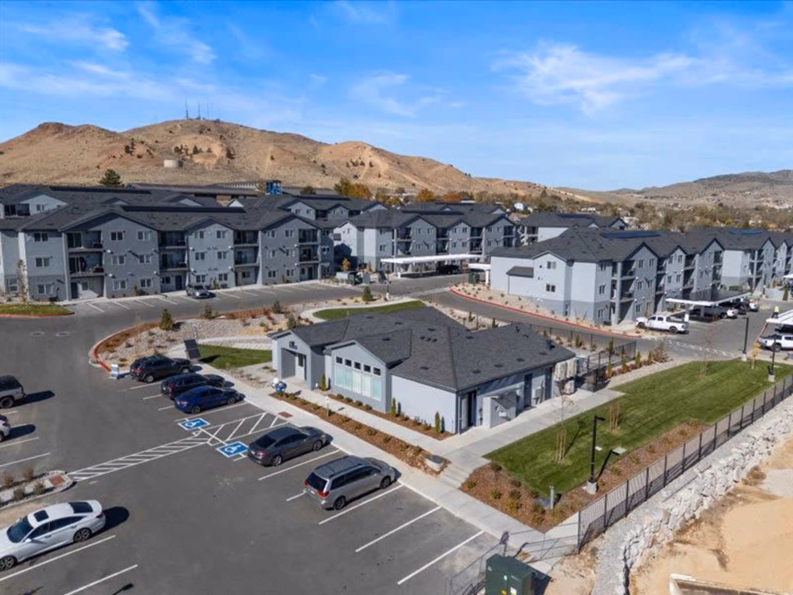 Exterior with view of parking lot and mountains in surrounding area