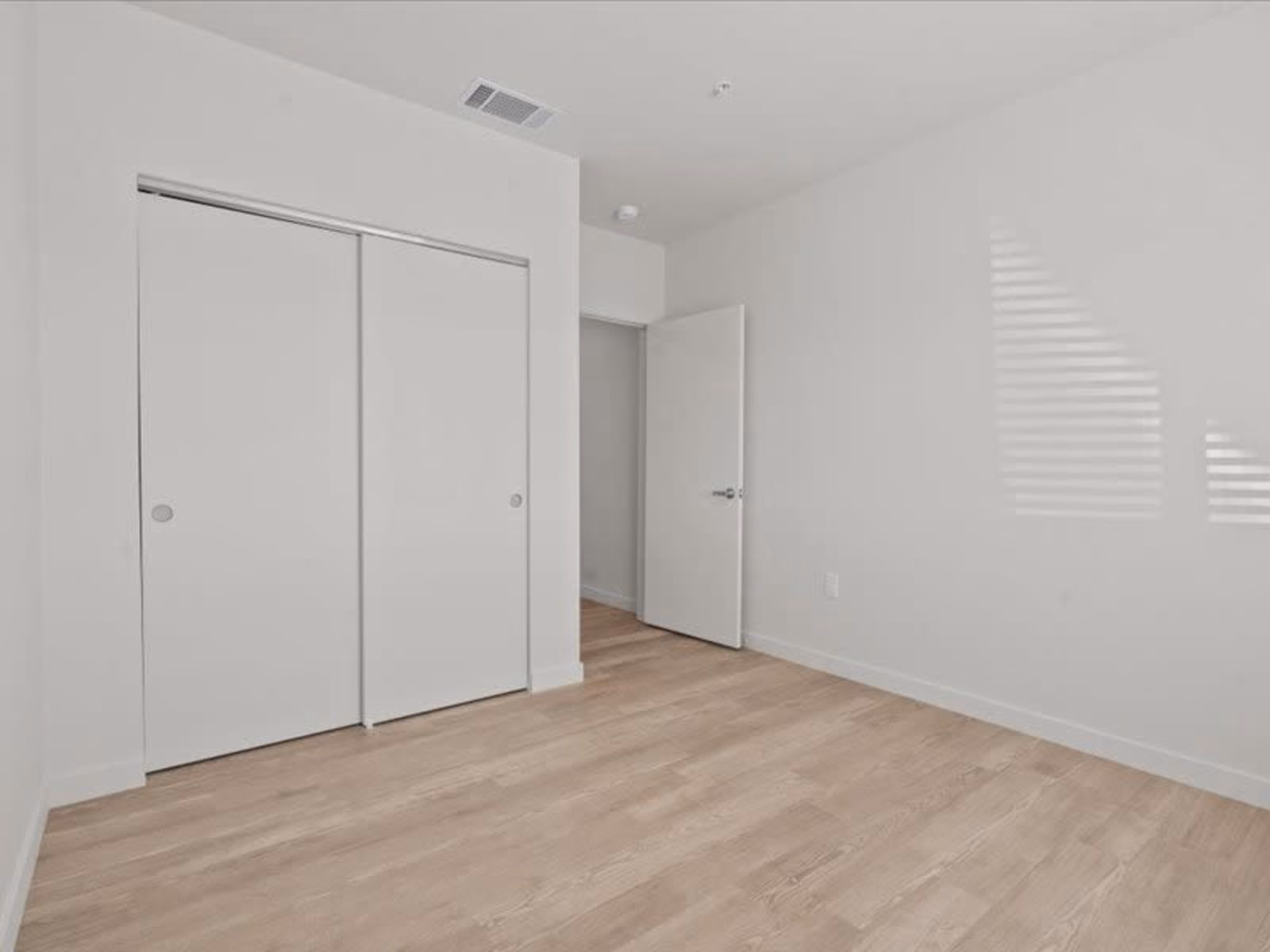 Unfurnished bedroom with large closet