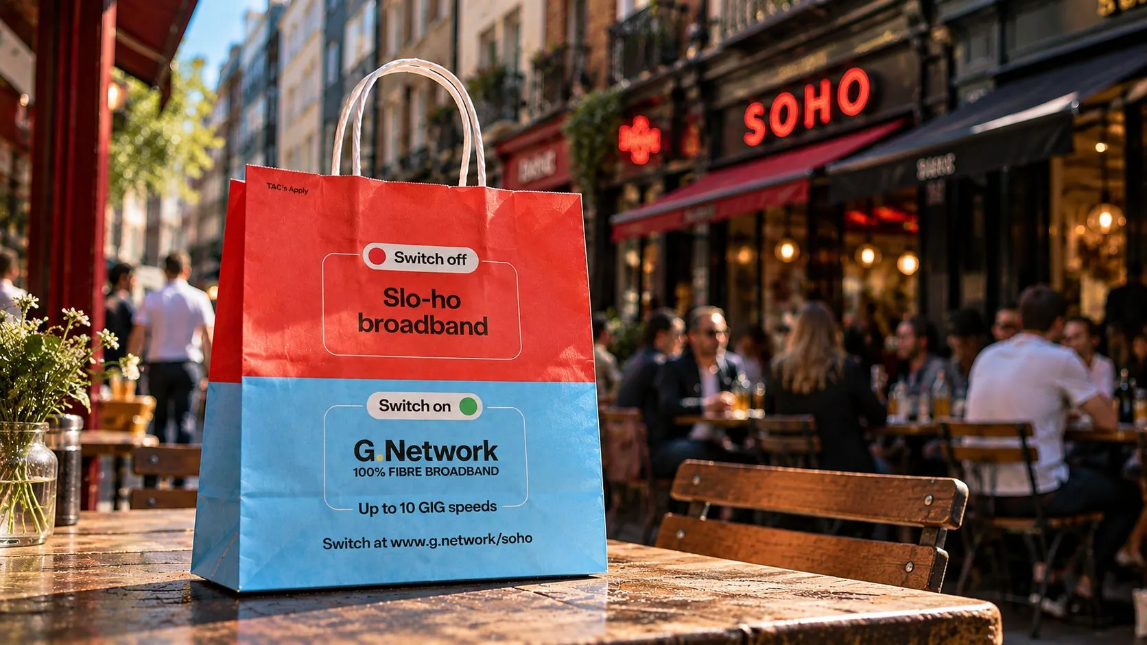 G.Network 'Slo-ho broadband' takeaway bag on a terrace table outside Soho bars and restaurants