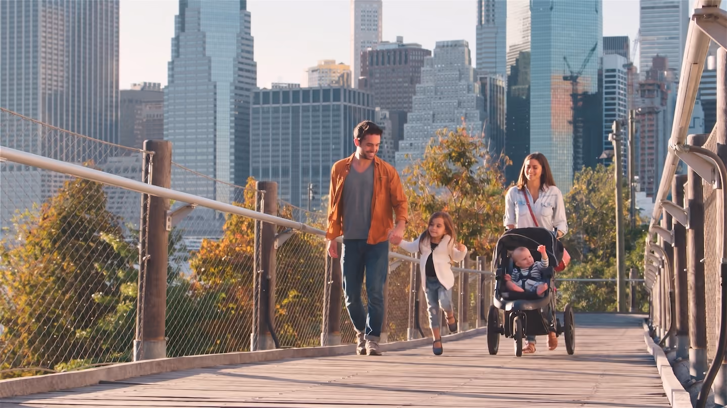 Family Walking In a City Stock Image