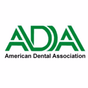 Logo of the American Dental Association with stylized green letters ADA above the full name in black text.