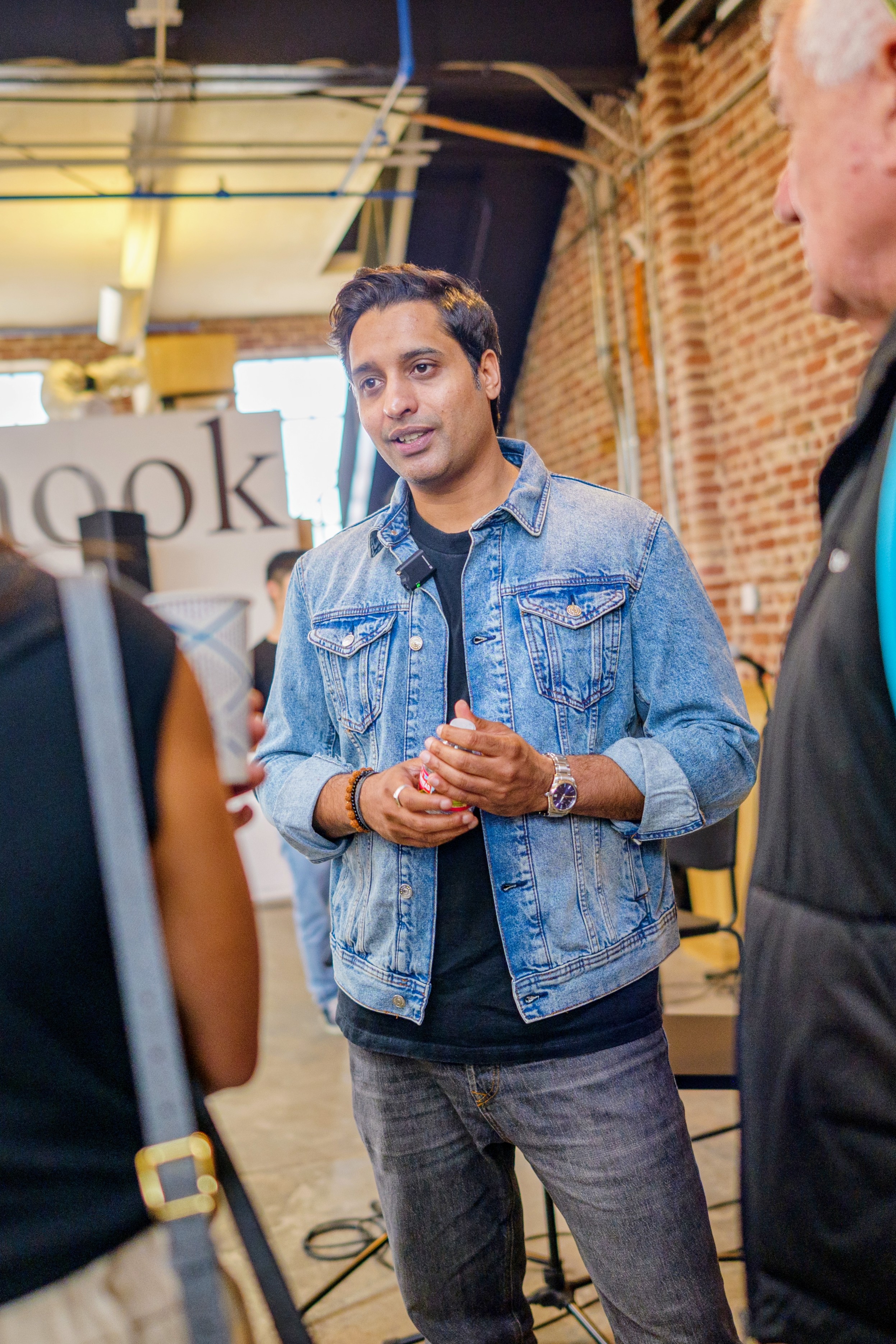 Nikhil Choudhary in conversation with attendees at a technology event