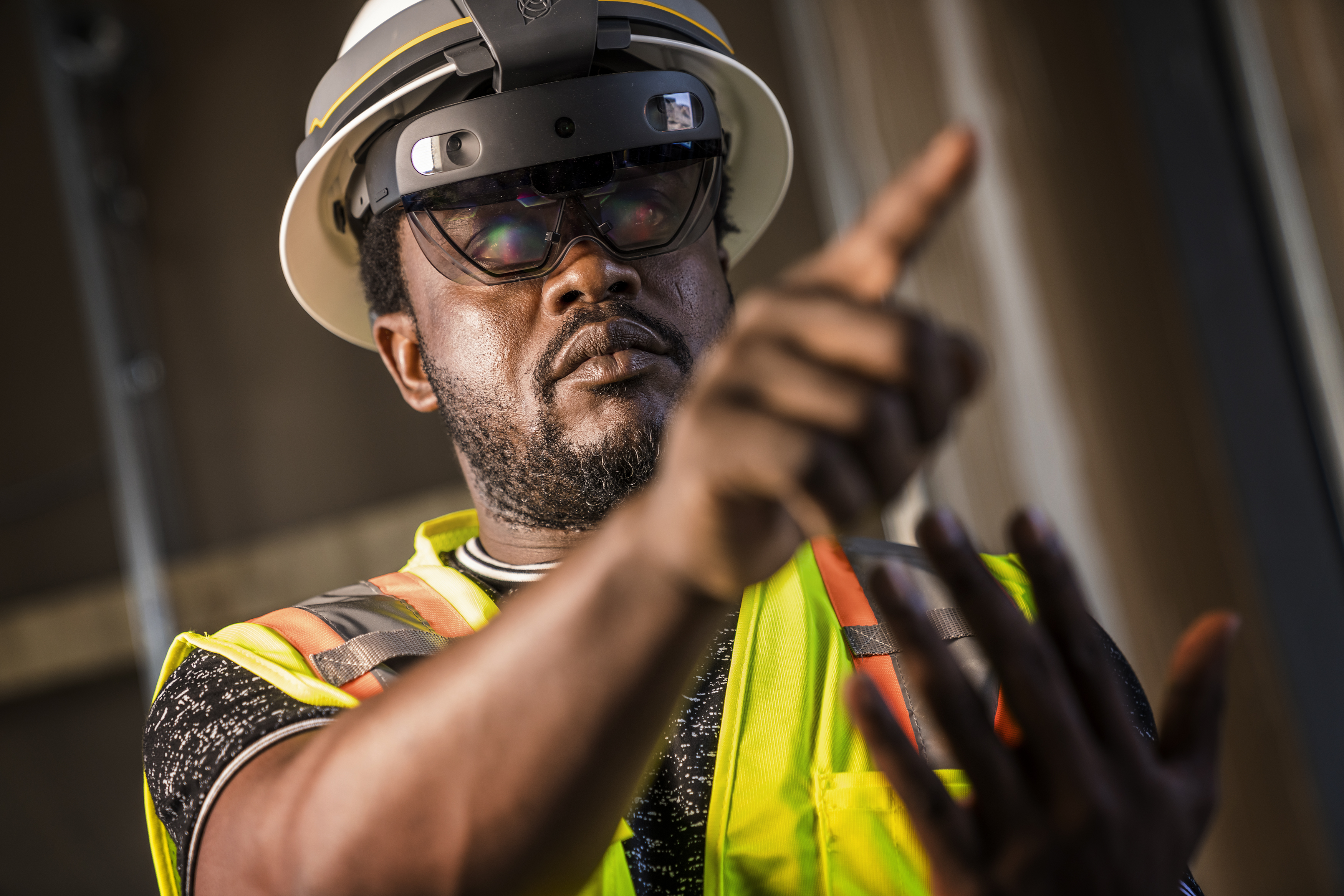 Construction worker wearing safety gear and smart glasses