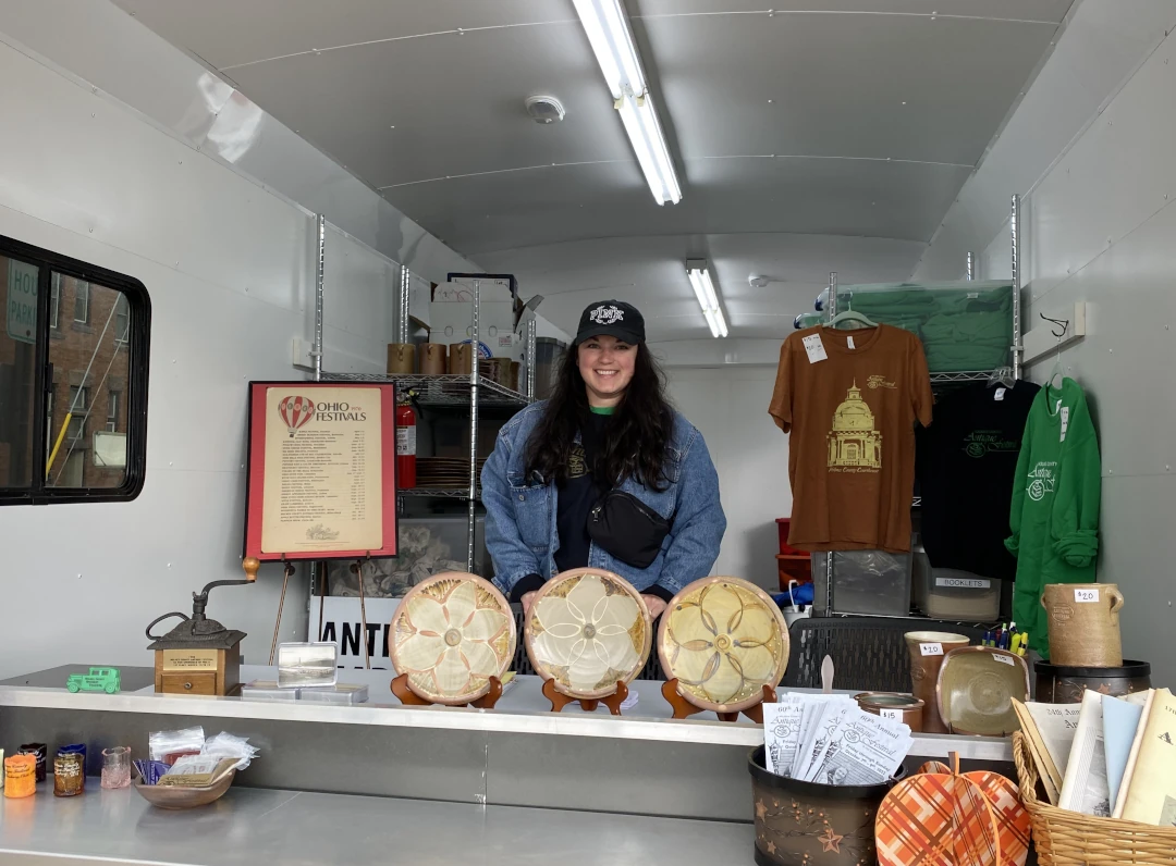 antique festival vendor plates and shirts