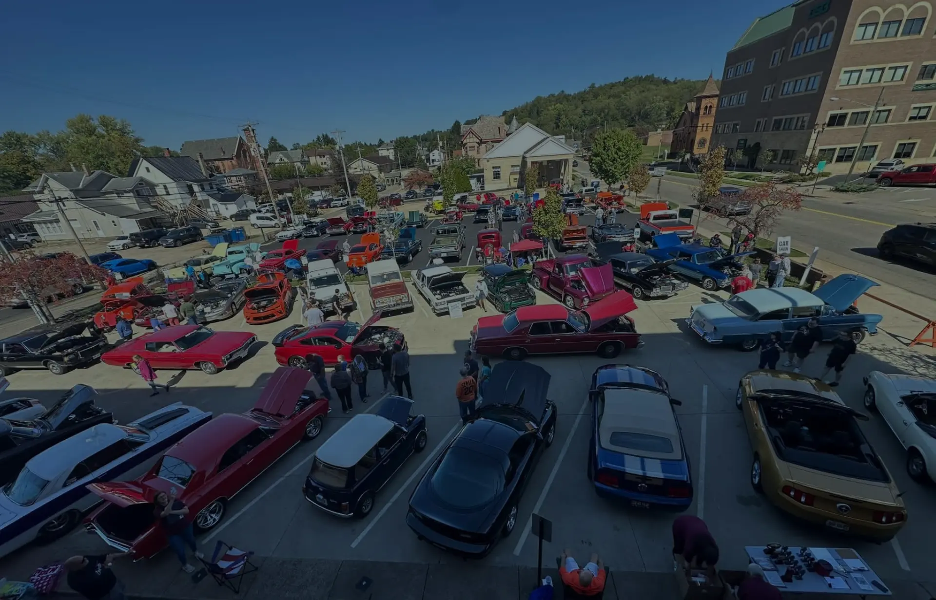 a number of antique cars parked