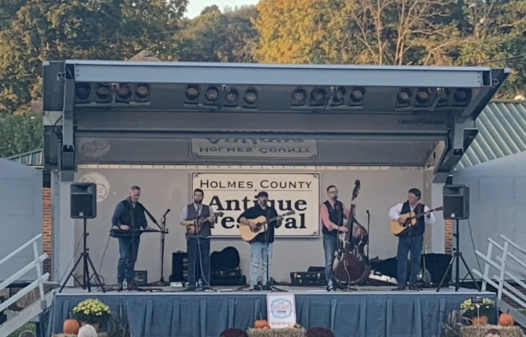 full band playing on antique festival main stage