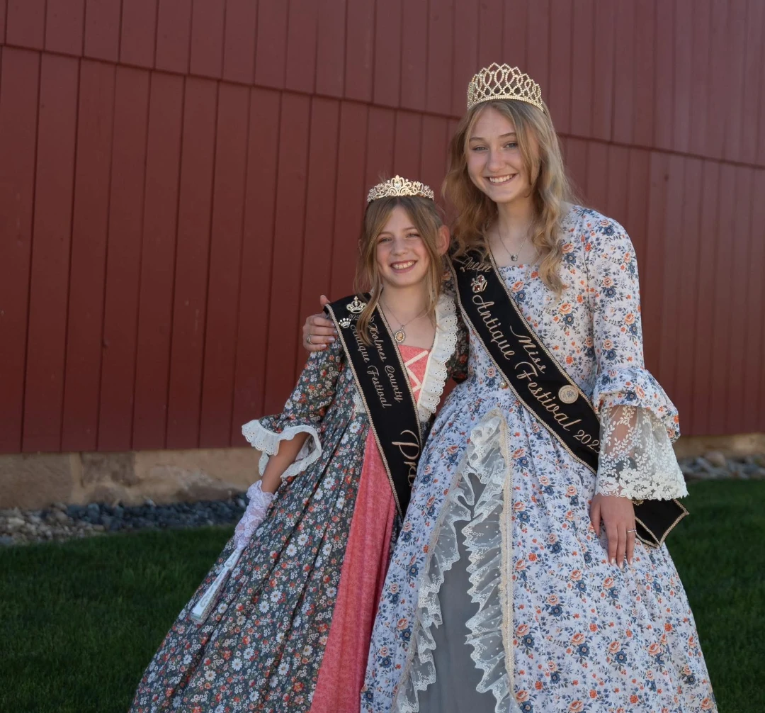 queen and princess standing together for picture
