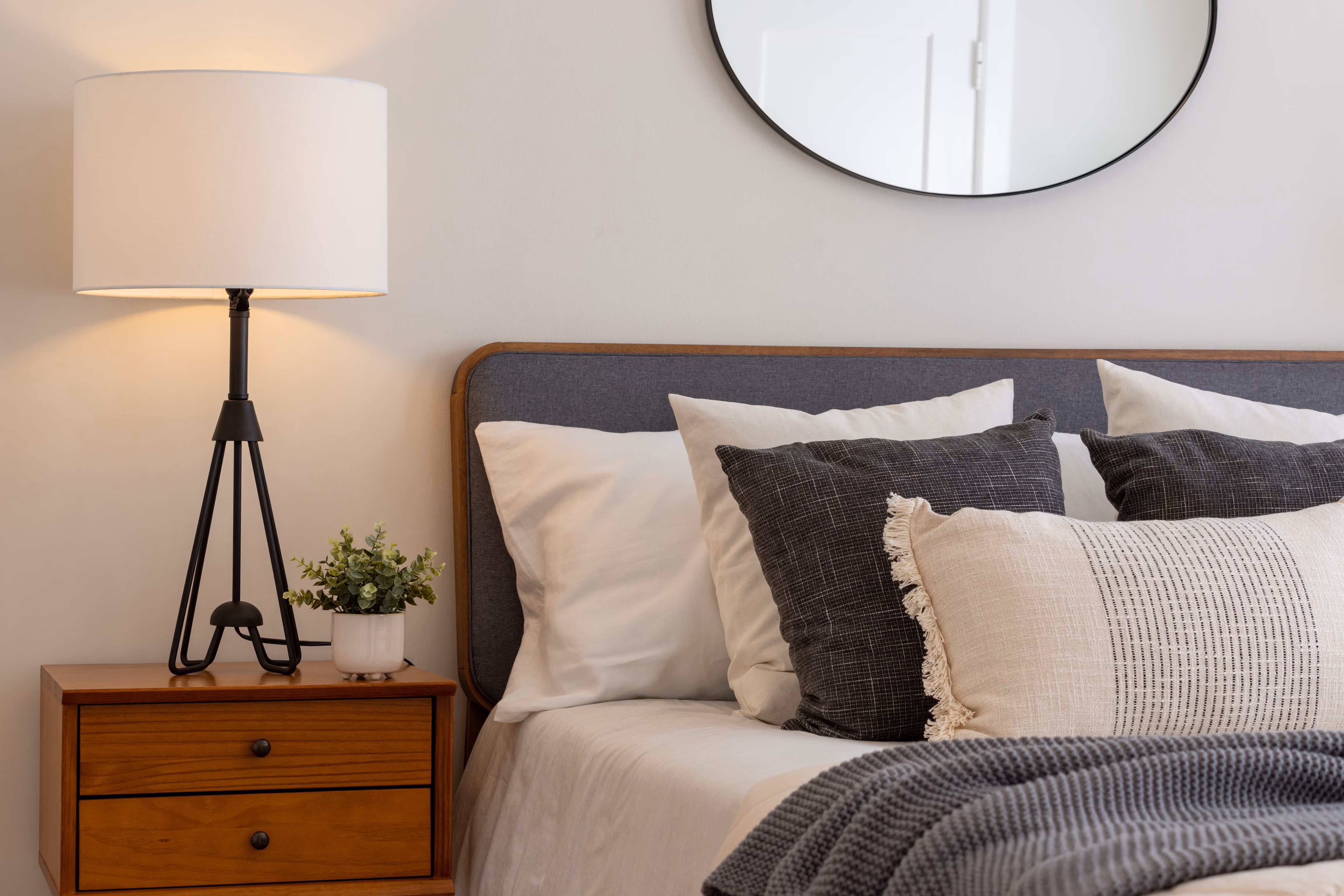 Bedroom with bed and nighstand stock image