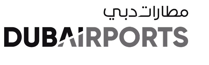 Logo of Dubai Airports with English and Arabic text.