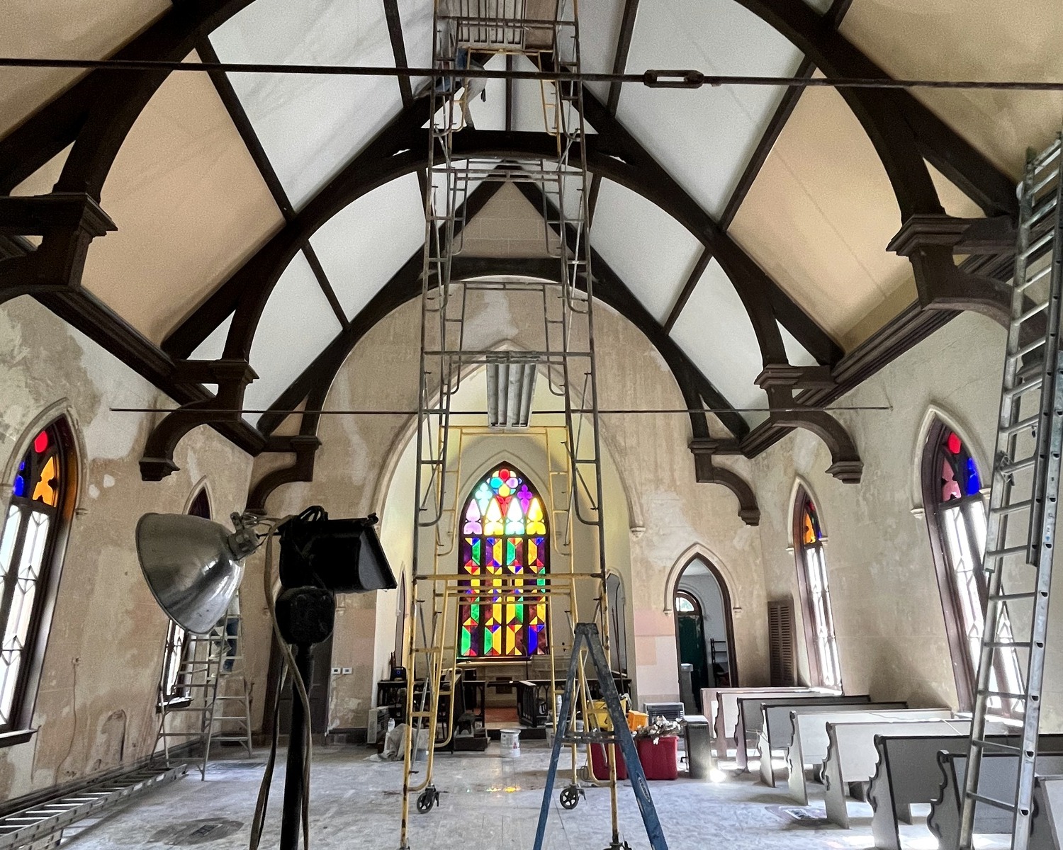 Christ Church interior during restoration with scaffolding and work in progress.