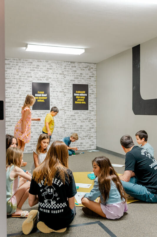 Kids playing a game together in UpStreet
