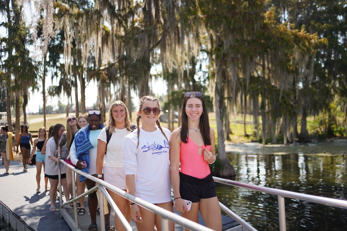 A group of students on the dock at Real Life Camp
