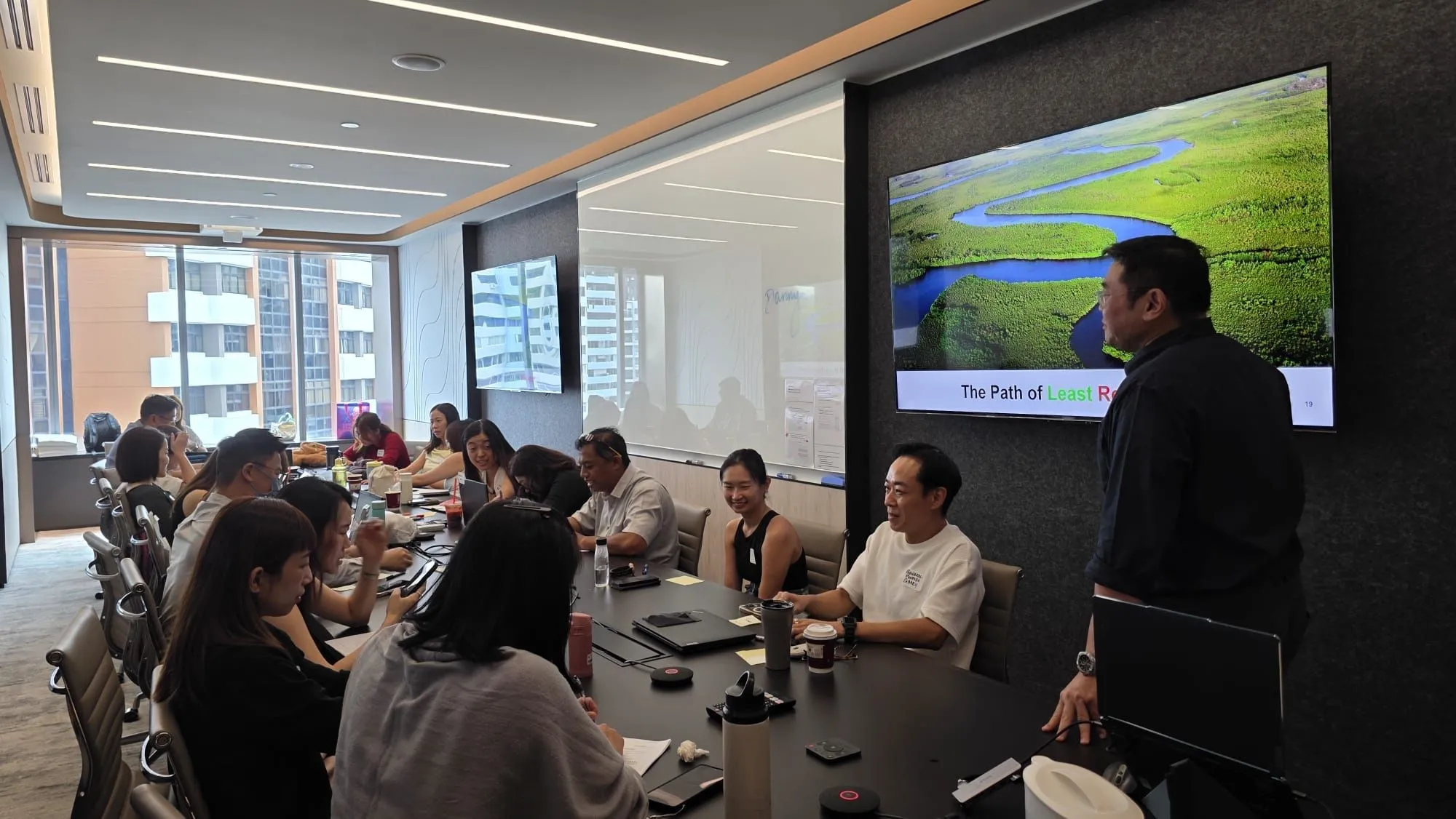 Danny facilitating a leadership workshop in a boardroom
