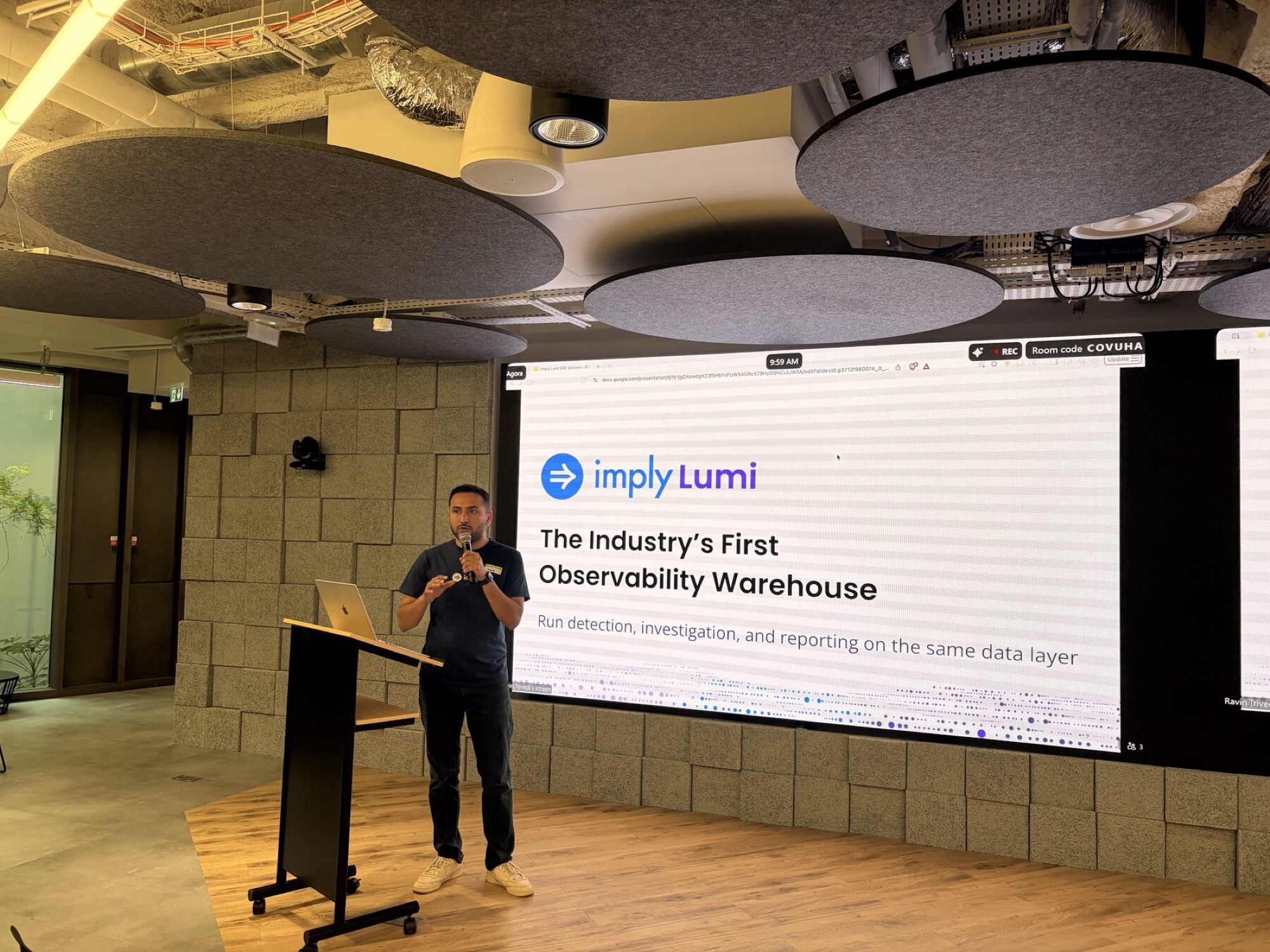 An Imply team member presenting at a conference