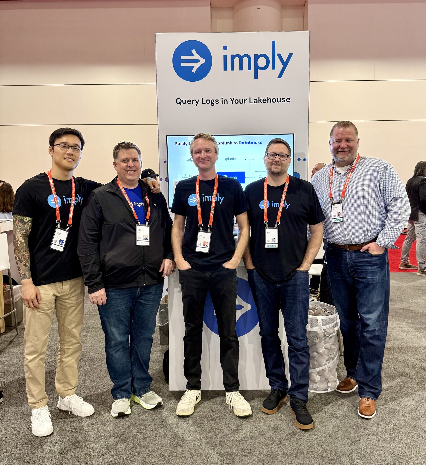 Imply team members at the Imply booth