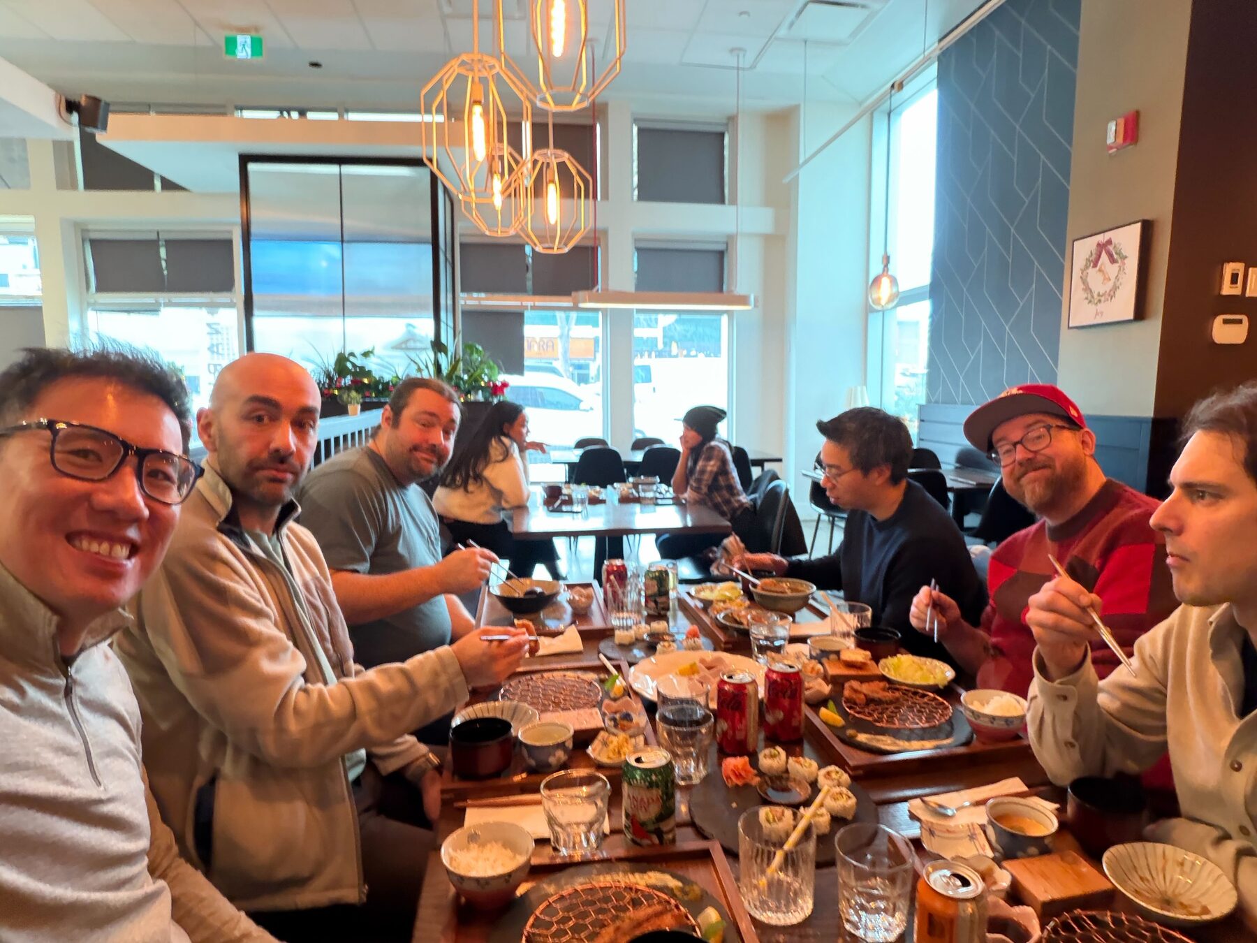 Imply team members sharing lunch together