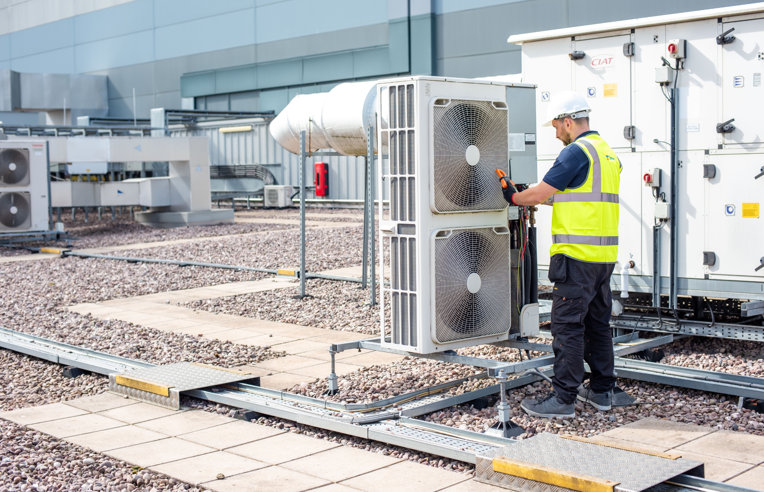 Emtec engineer working on commercial HVAC plant
