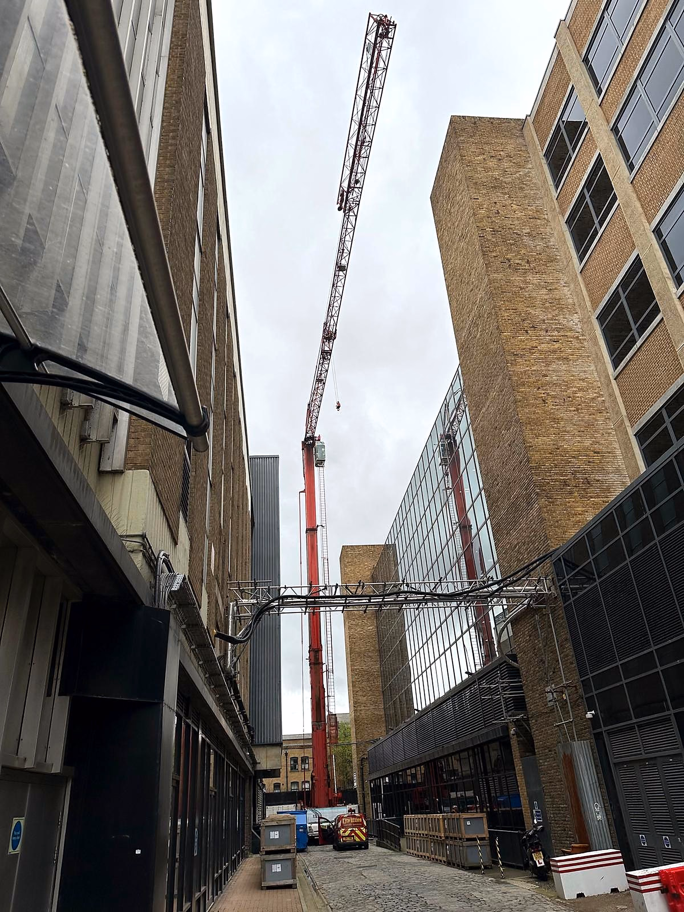 Contracted crane lift taking replacement plant to roof level