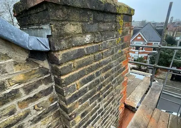 Chimney stack repointing and restoration on residential building